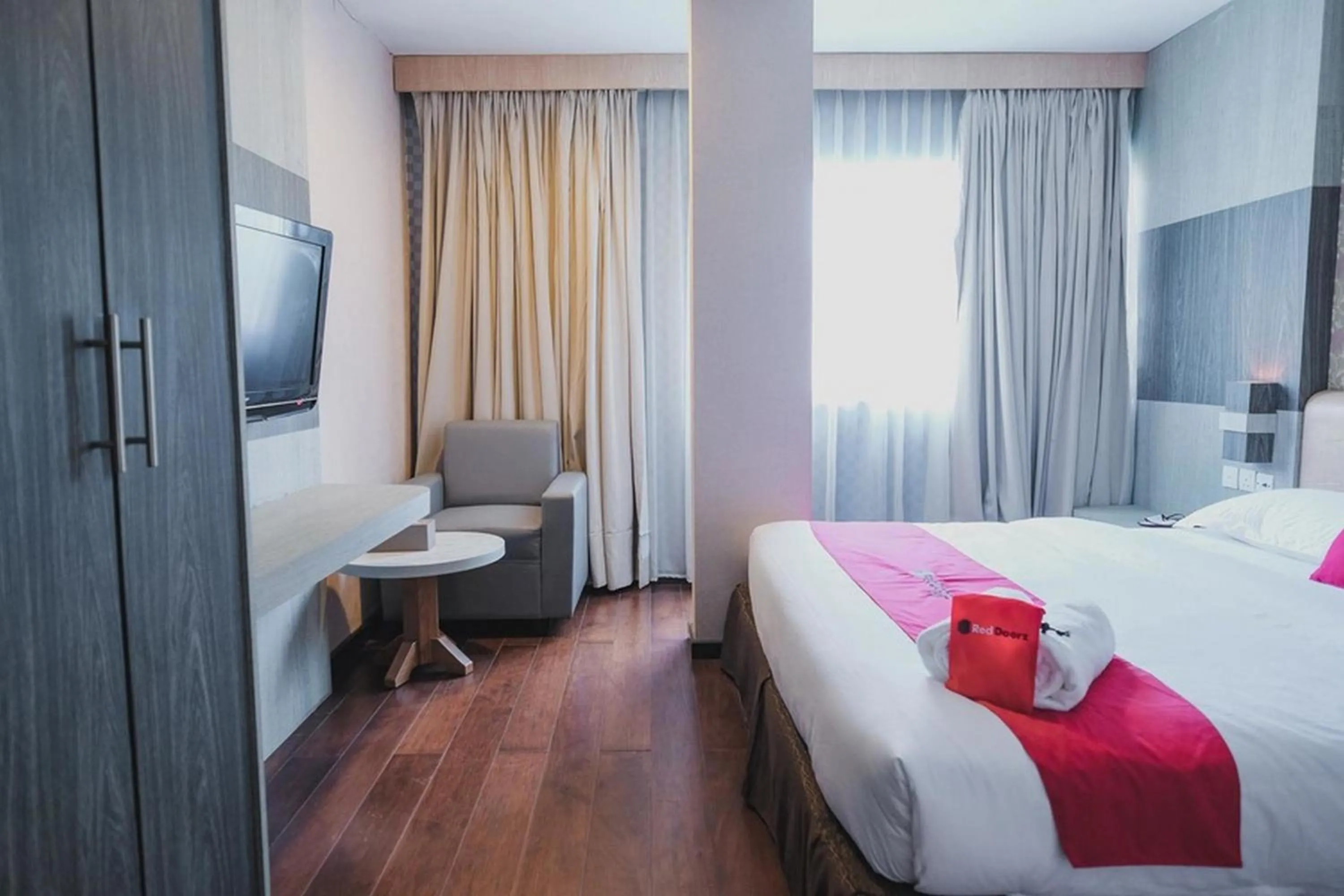 Bed in RedDoorz Plus near Gold Coast Ferry Terminal Batam