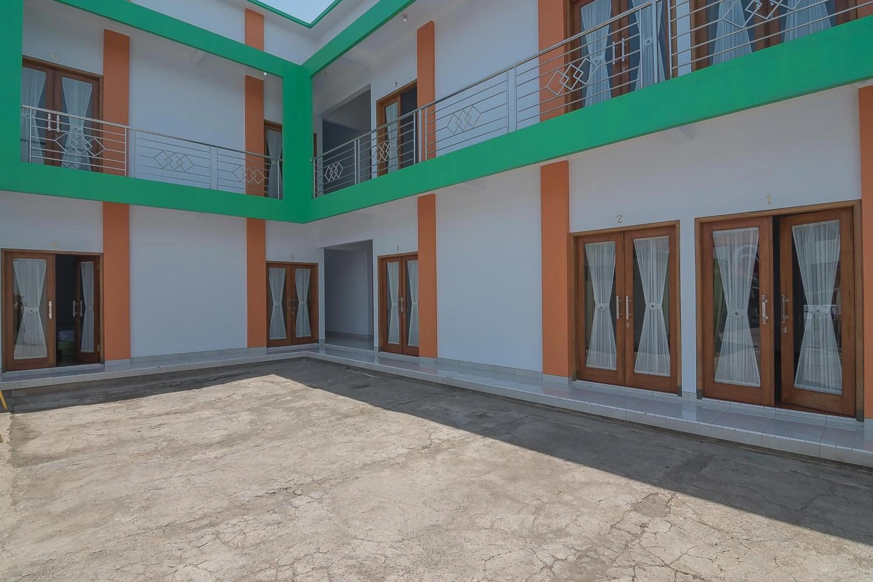 Facade/entrance in RedDoorz Plus near Alun Alun Kuningan