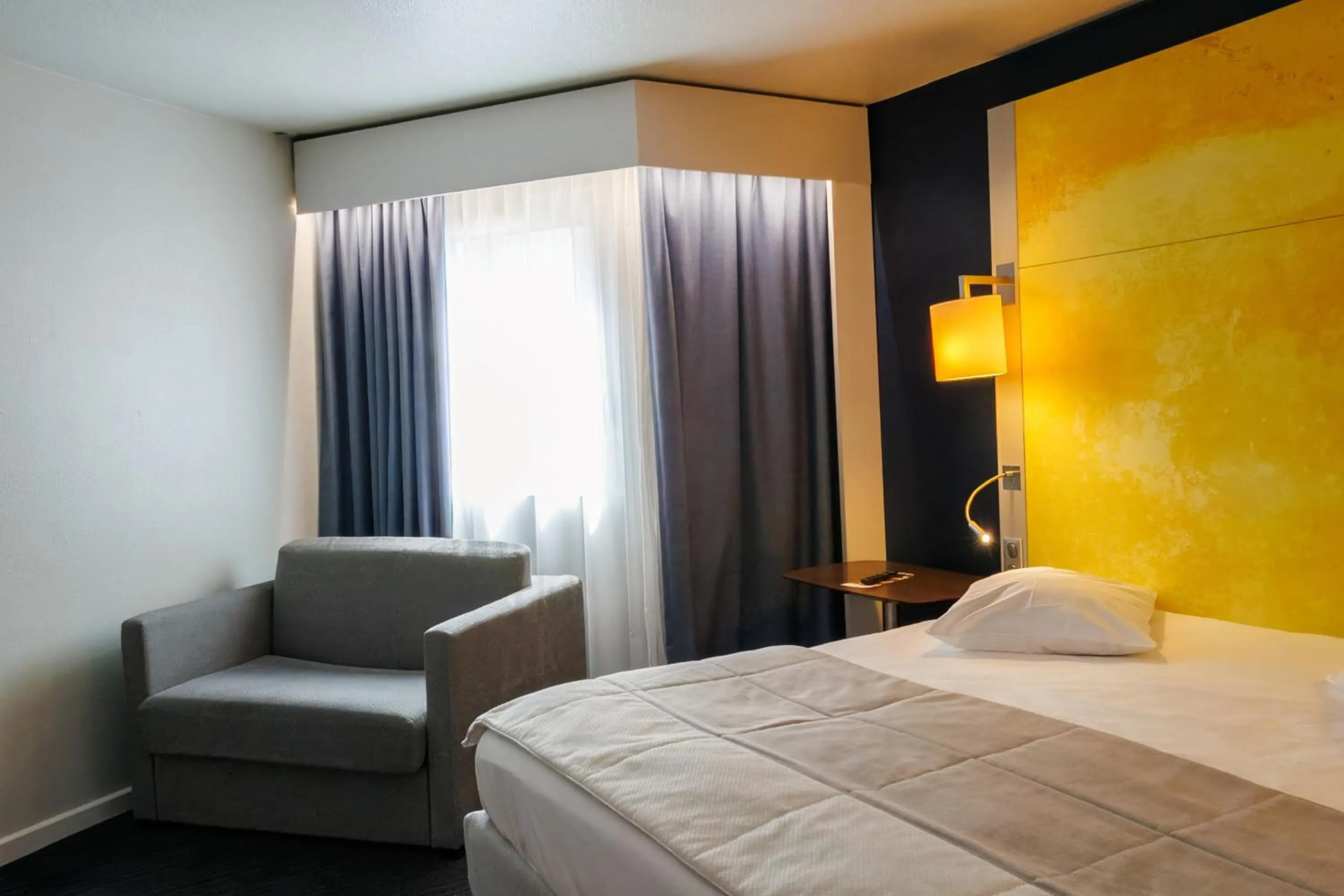 Photo of the whole room, Bed in Mercure Rouen Centre Cathédrale