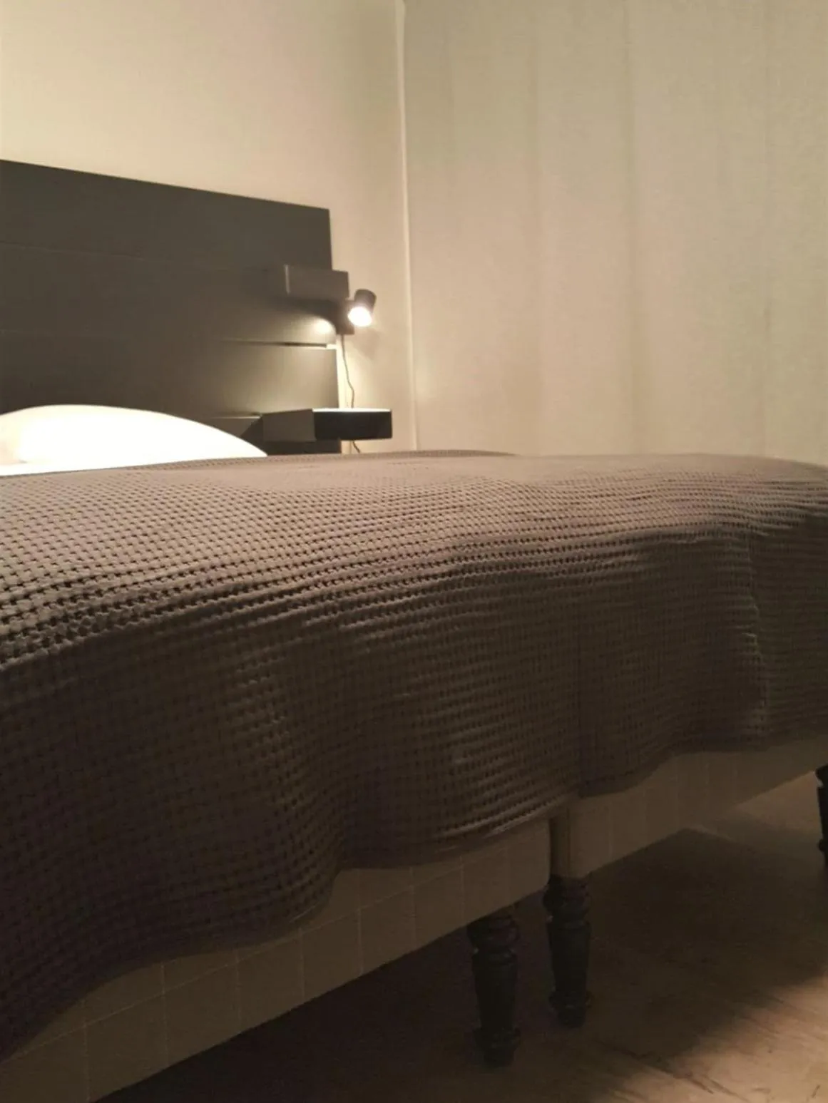 Bed in Koto Hotel Pihtipudas