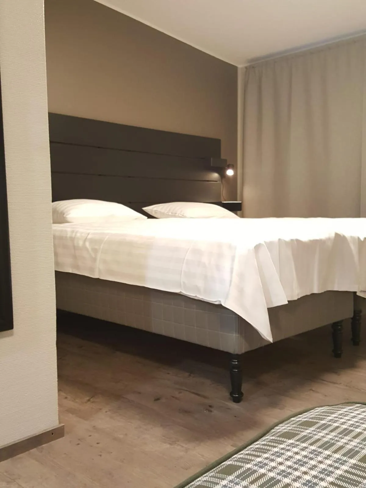 Bed in Koto Hotel Pihtipudas