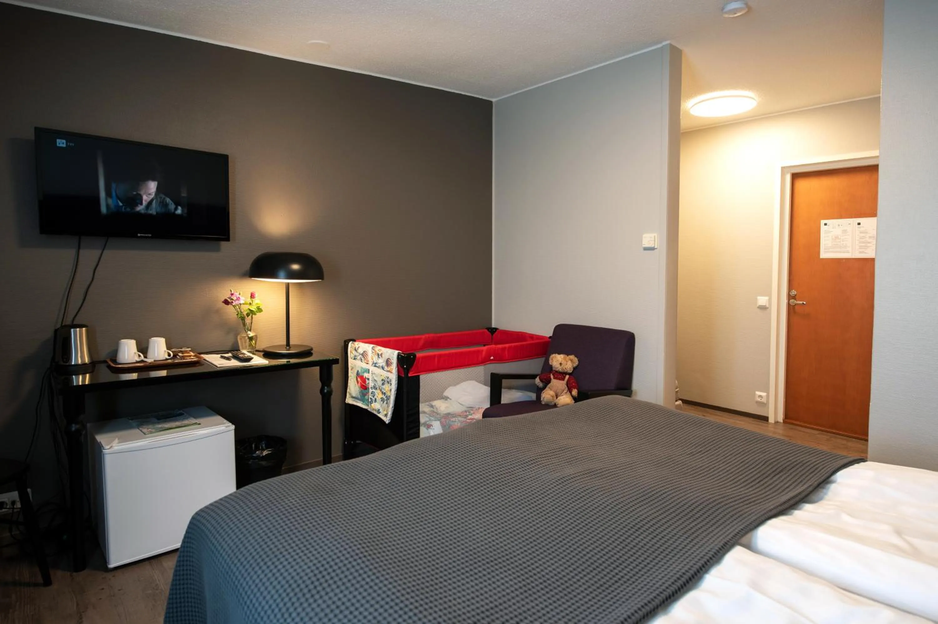 Bed in Koto Hotel Pihtipudas