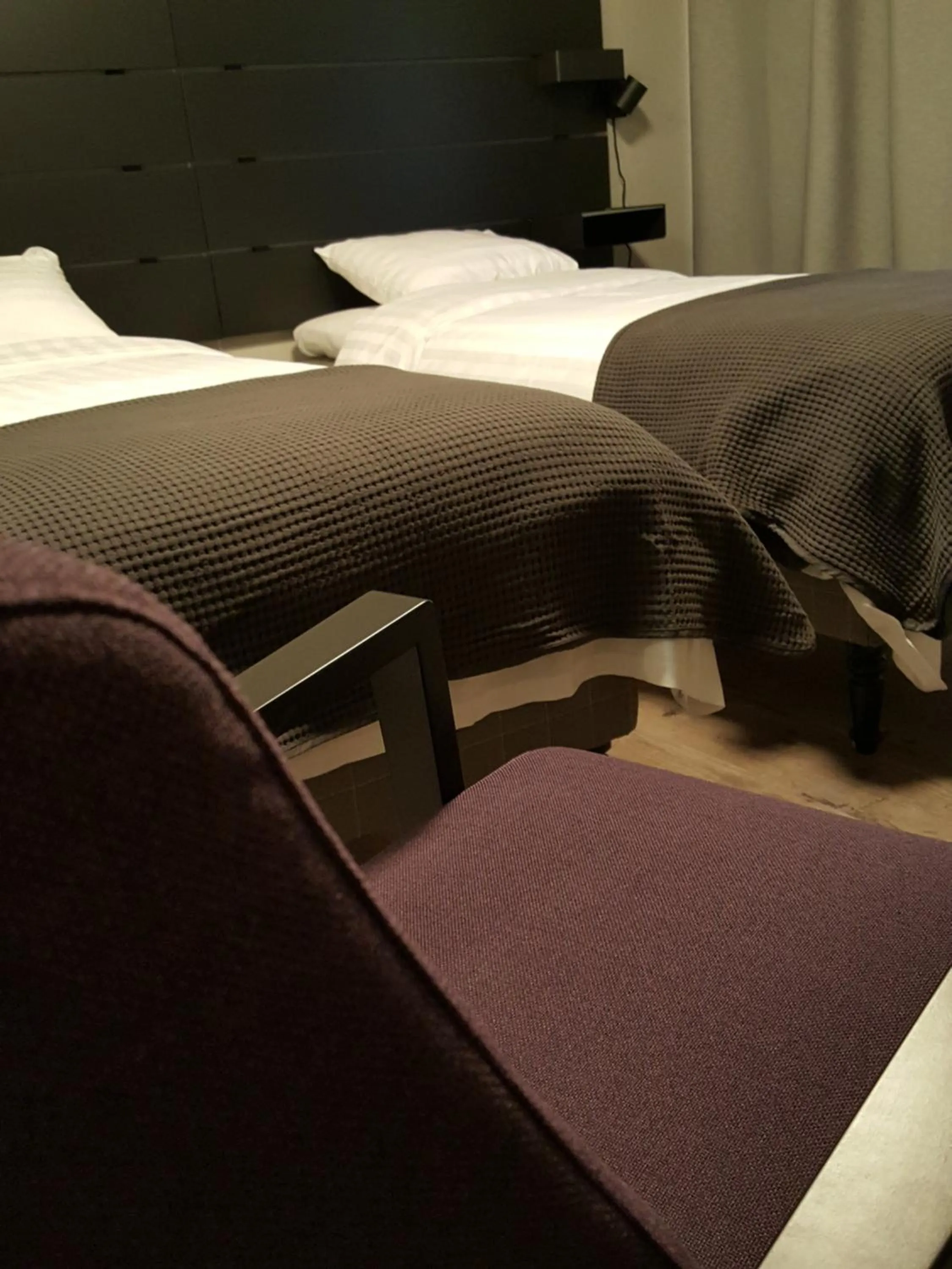 Bed in Koto Hotel Pihtipudas