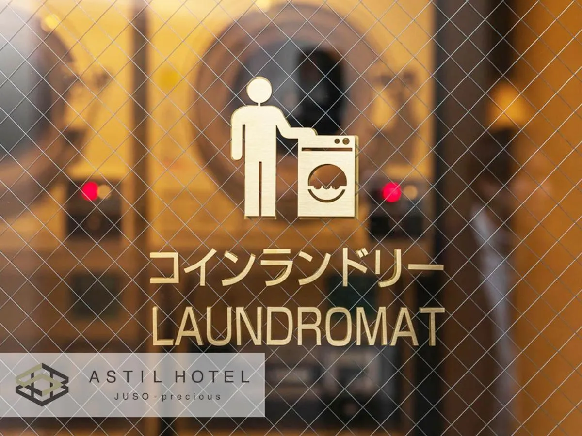 Property logo or sign in Astil Hotel Juso Precious