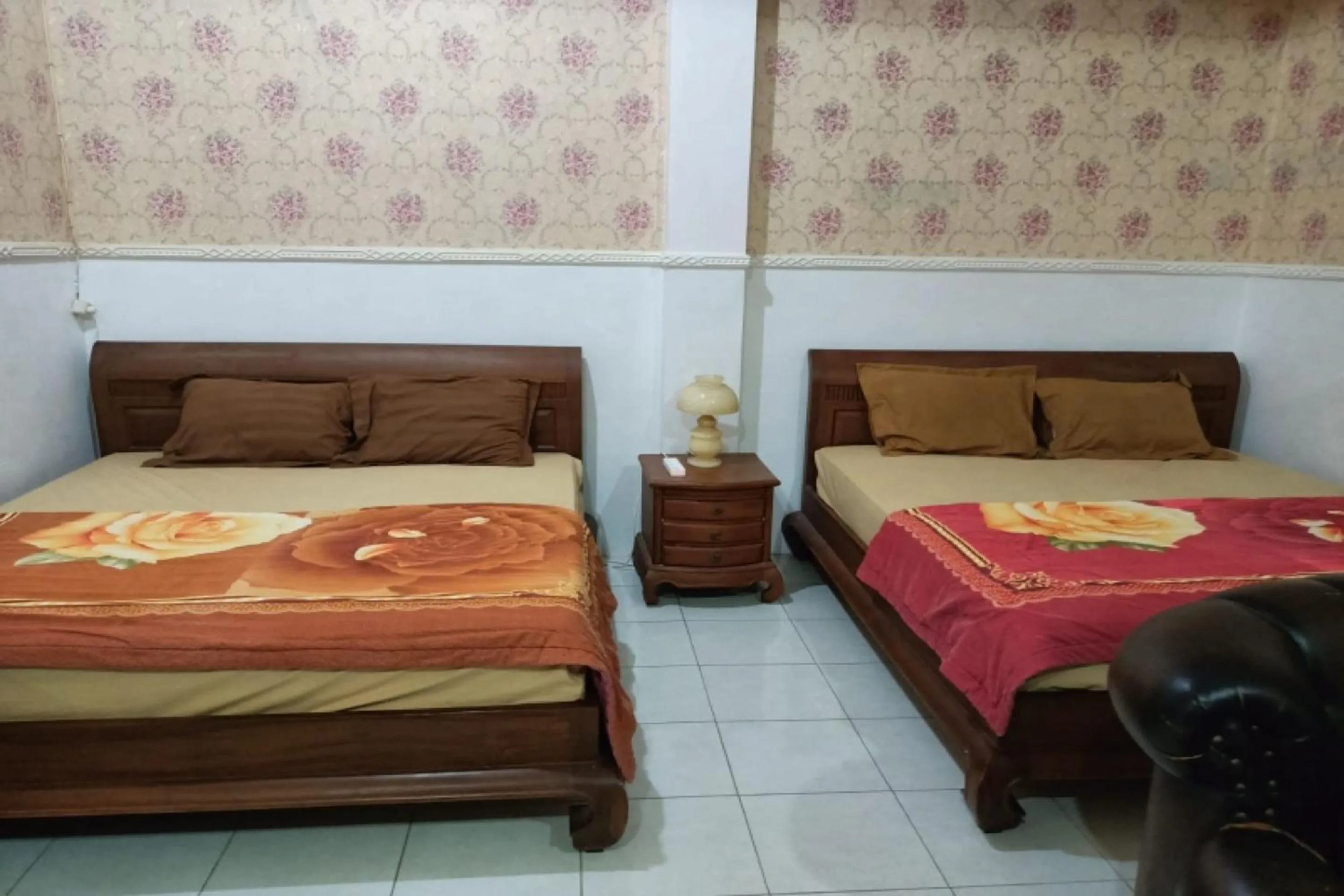 Bedroom in OYO 91232 Hotel Garuda