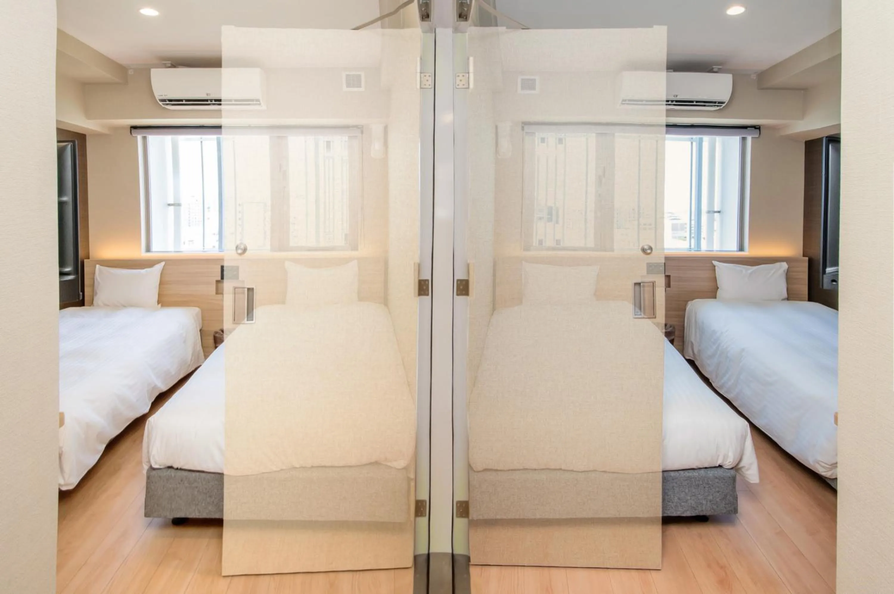 Bedroom, Bed in HOTEL SANSUI NAHA Ryukyu Onsen Naminoue-No-Yu