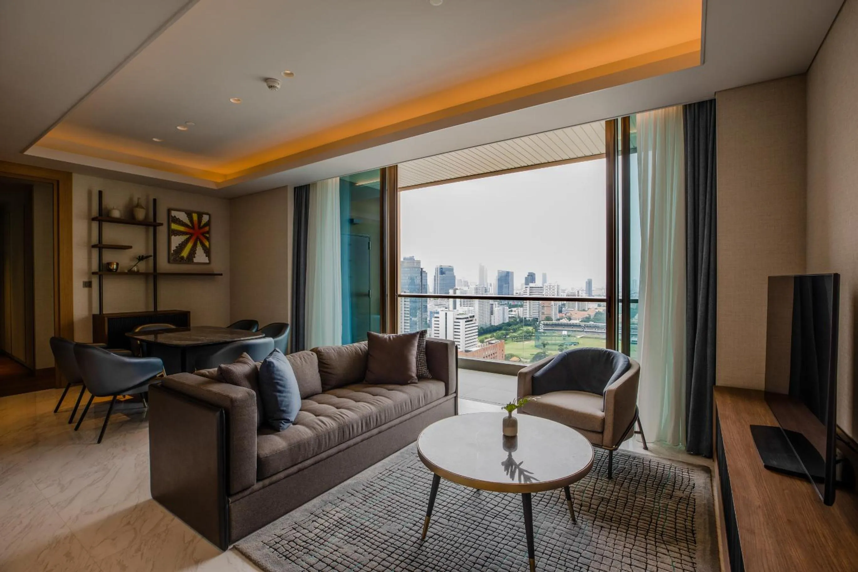 Communal lounge/ TV room in Kimpton Maa-Lai Bangkok by IHG