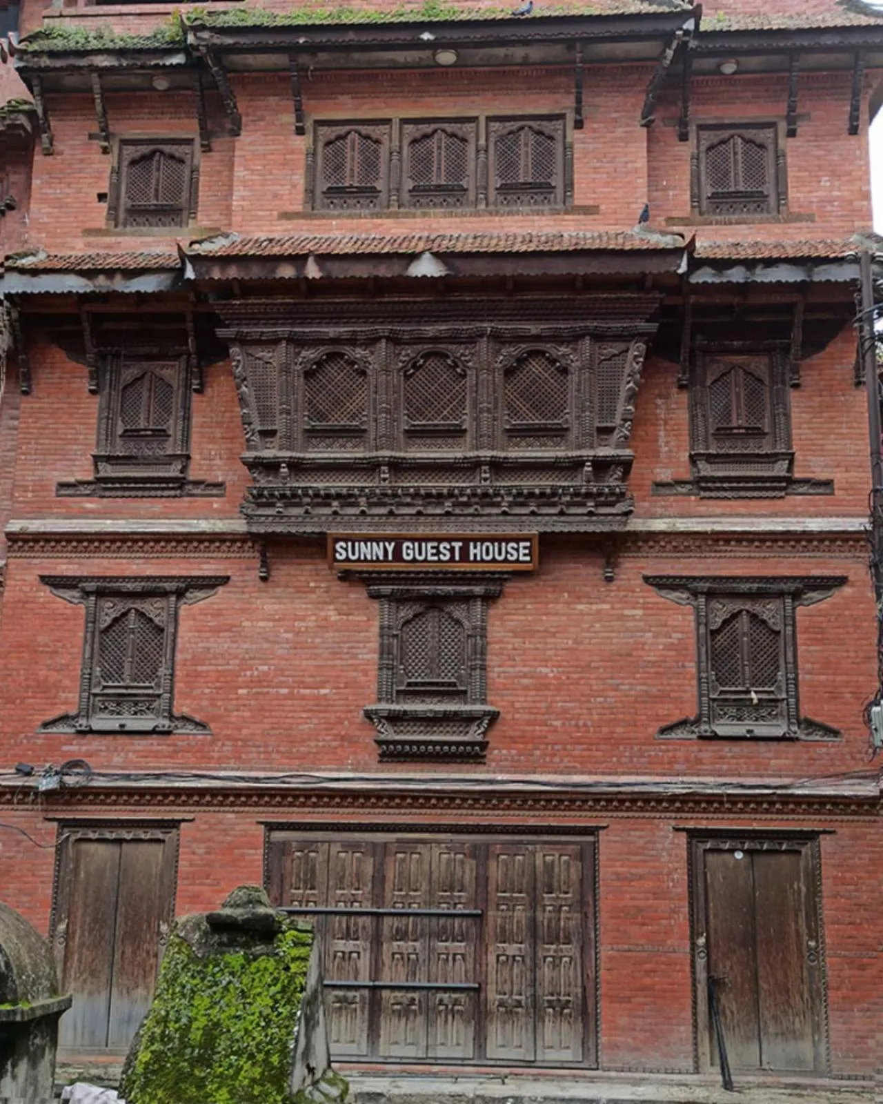 Property building in Sunny Guest House and Cafe