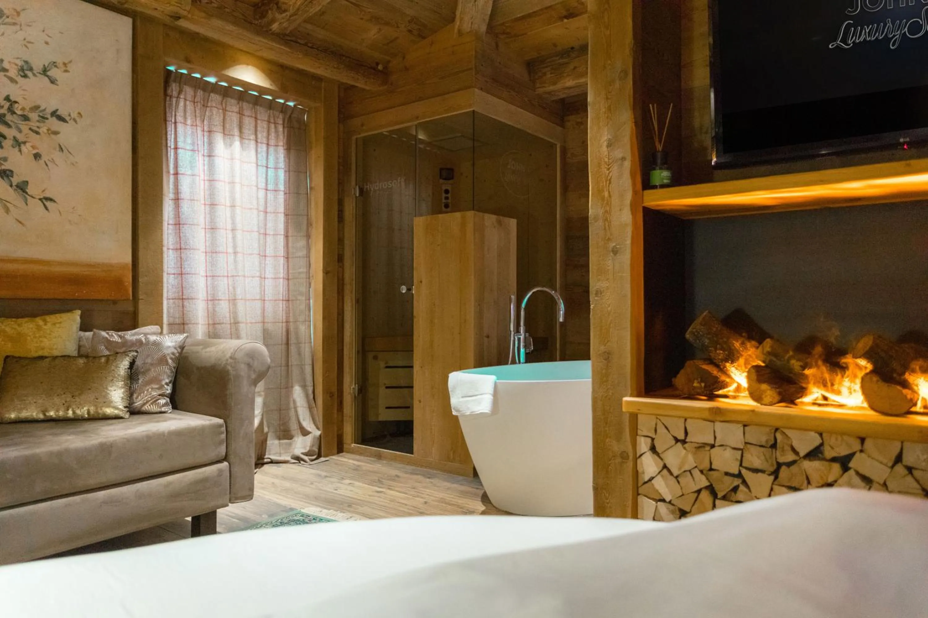 Bed in John Luxury Suites