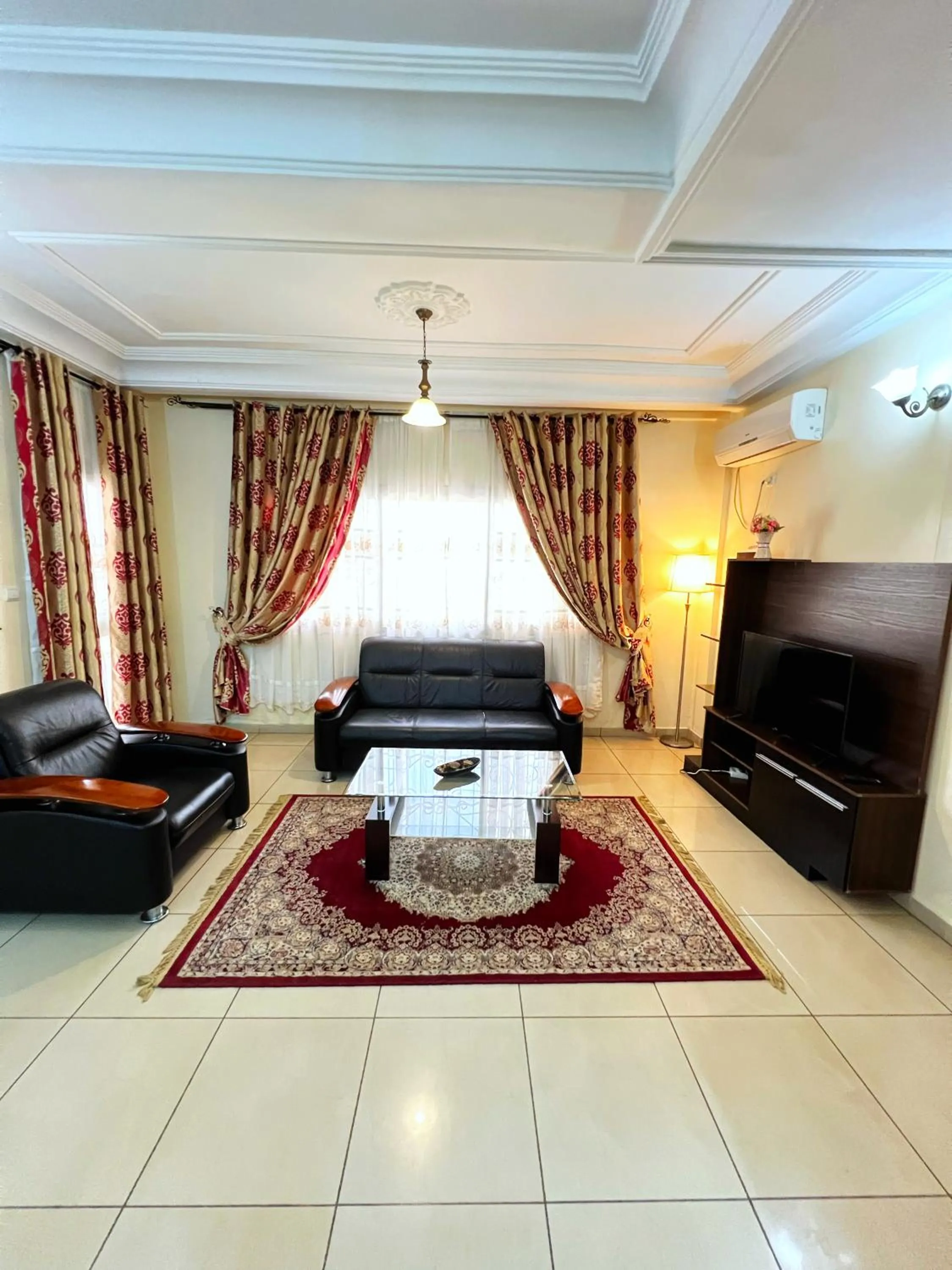 Living room in Résidences hôtelières Micheline et Emile BASTOS