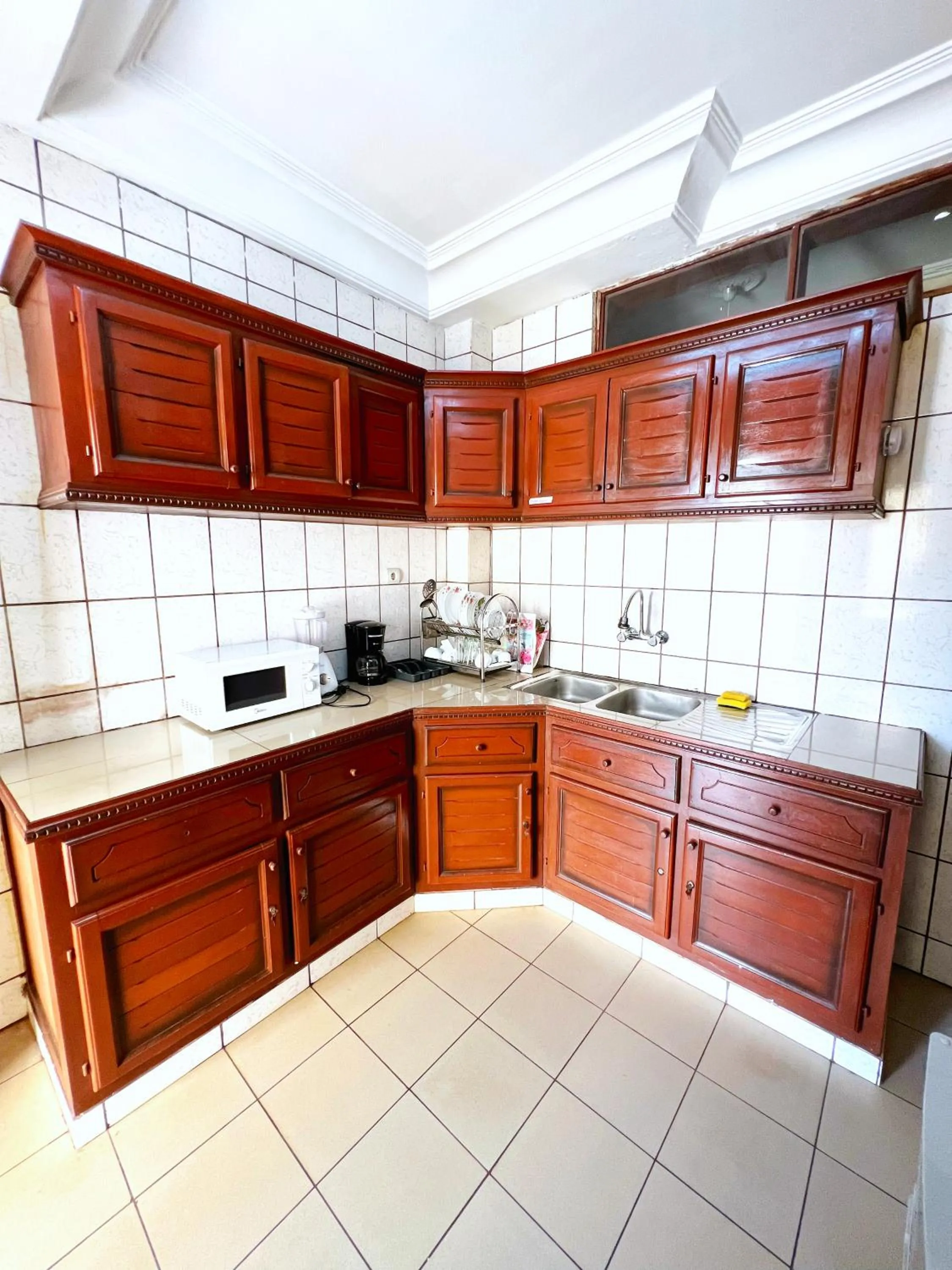 kitchen in Résidences hôtelières Micheline et Emile BASTOS