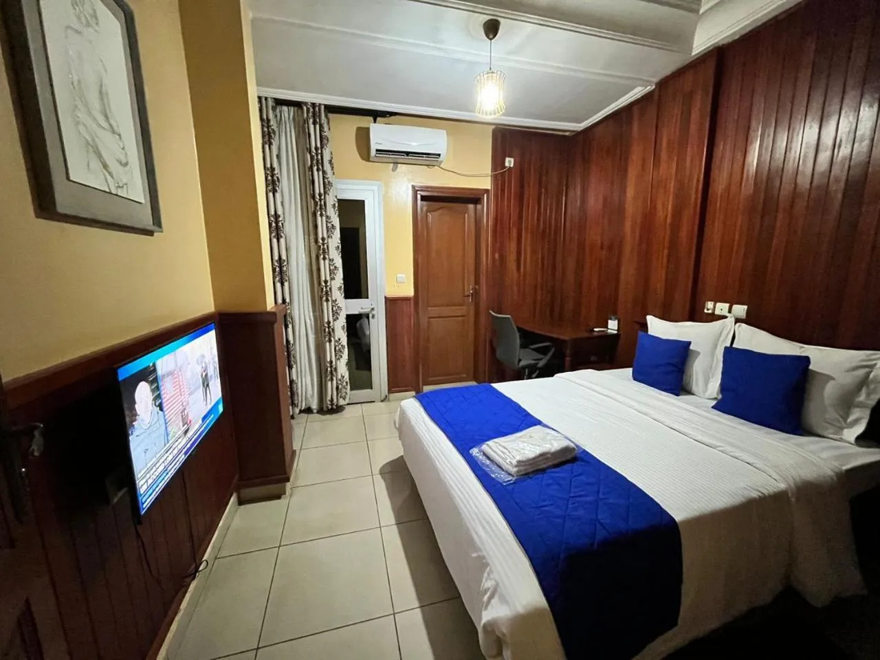 Photo of the whole room, Bed in Résidences hôtelières Micheline et Emile BASTOS