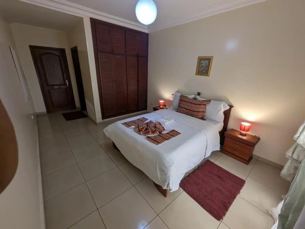 Photo of the whole room, Bed in Résidences hôtelières Micheline et Emile BASTOS