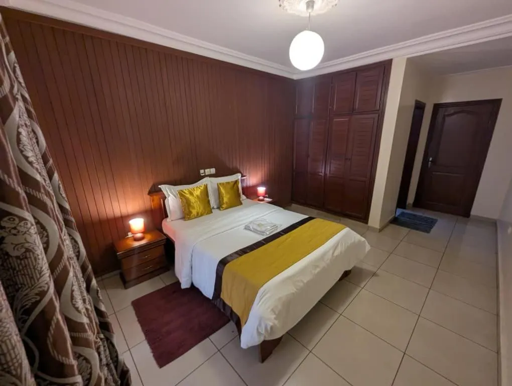 Photo of the whole room, Bed in Résidences hôtelières Micheline et Emile BASTOS