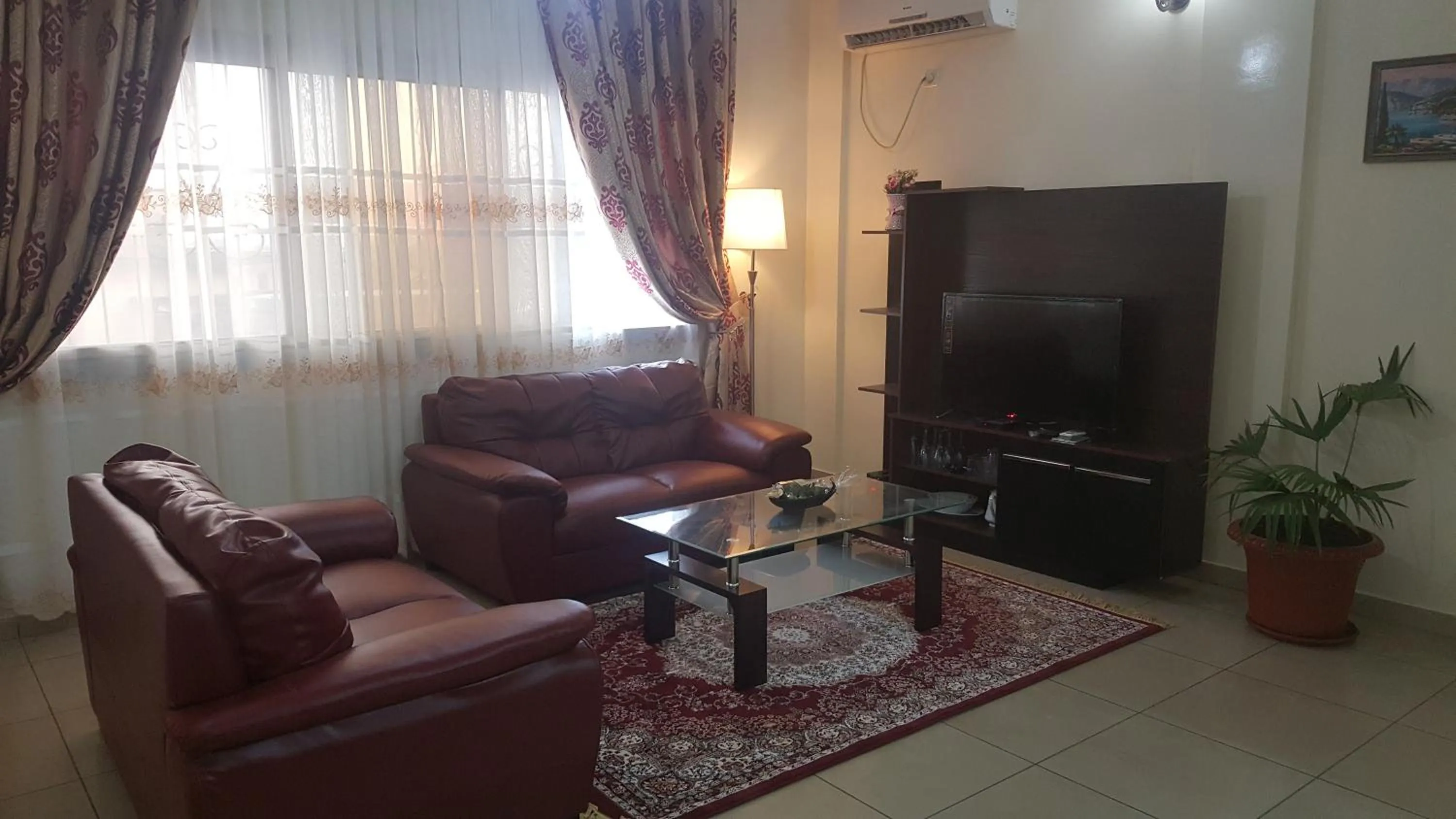 Living room in Résidences hôtelières Micheline et Emile BASTOS