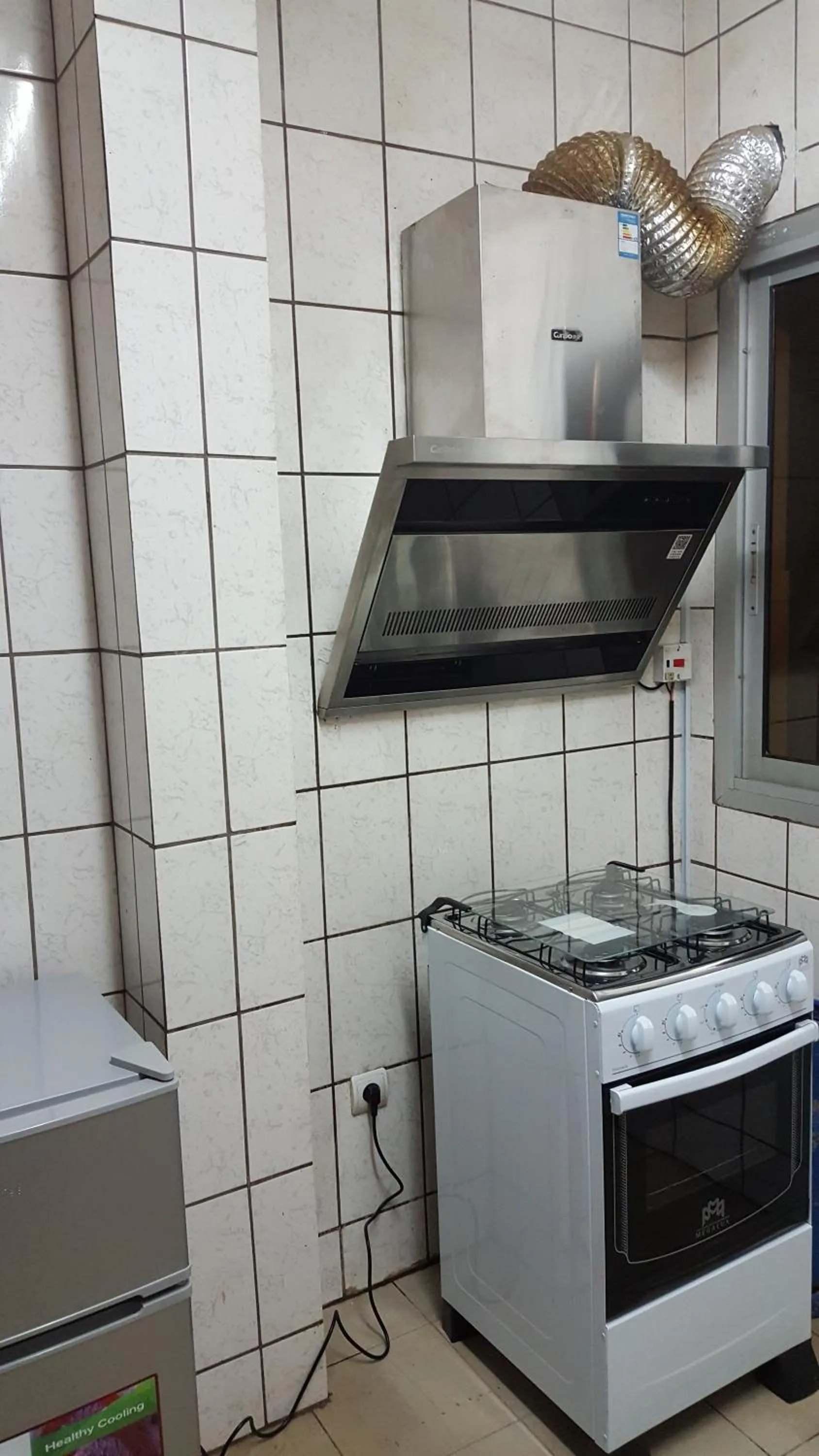 Kitchen or kitchenette in Résidences hôtelières Micheline et Emile BASTOS