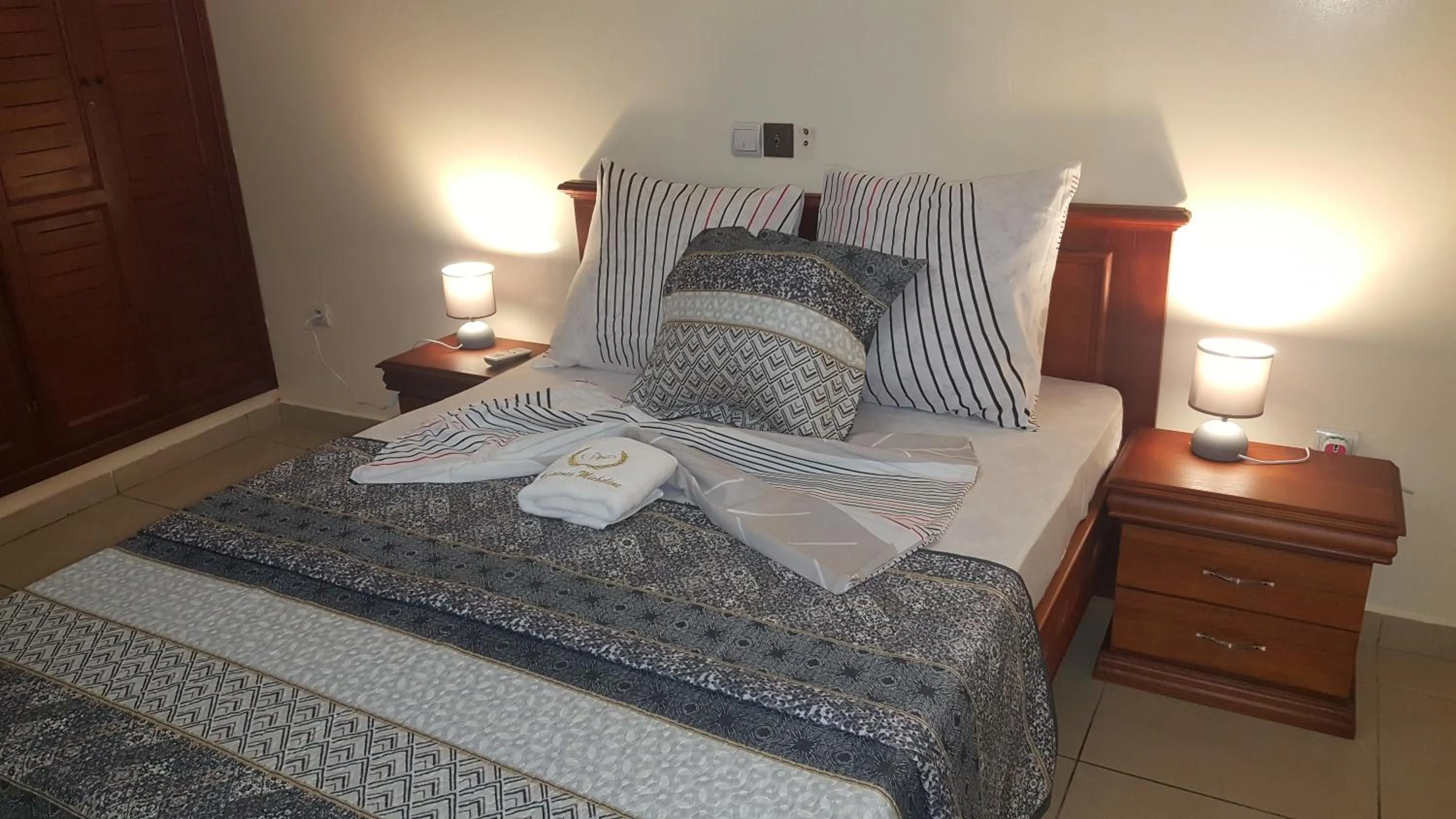 Bedroom, Bed in Résidences hôtelières Micheline et Emile BASTOS