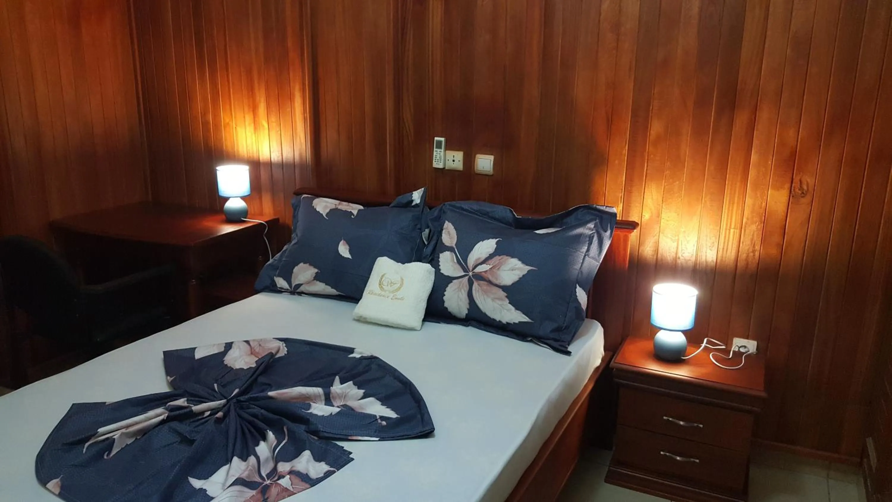 Bed in Résidences hôtelières Micheline et Emile BASTOS