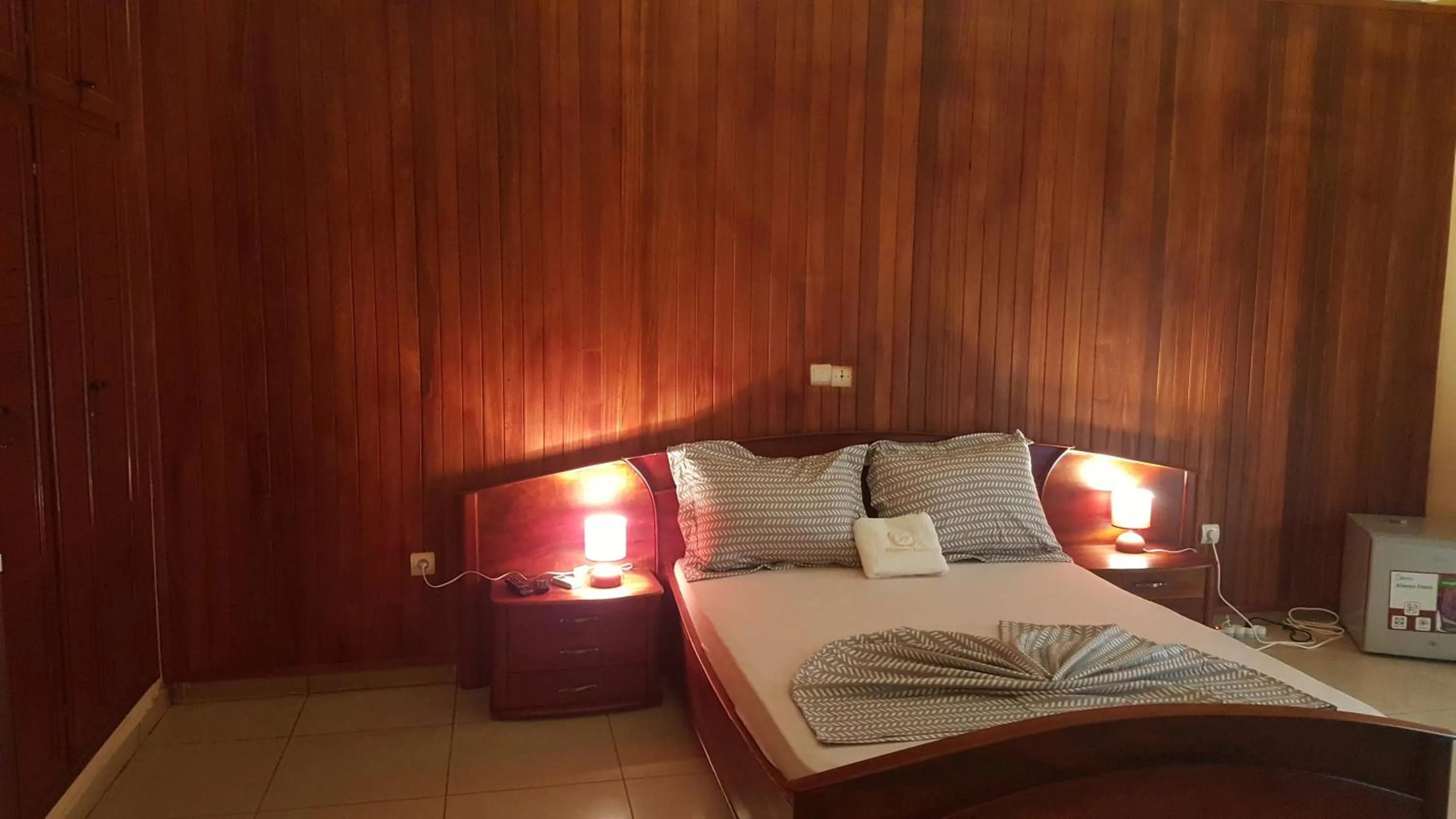 Bed in Résidences hôtelières Micheline et Emile BASTOS