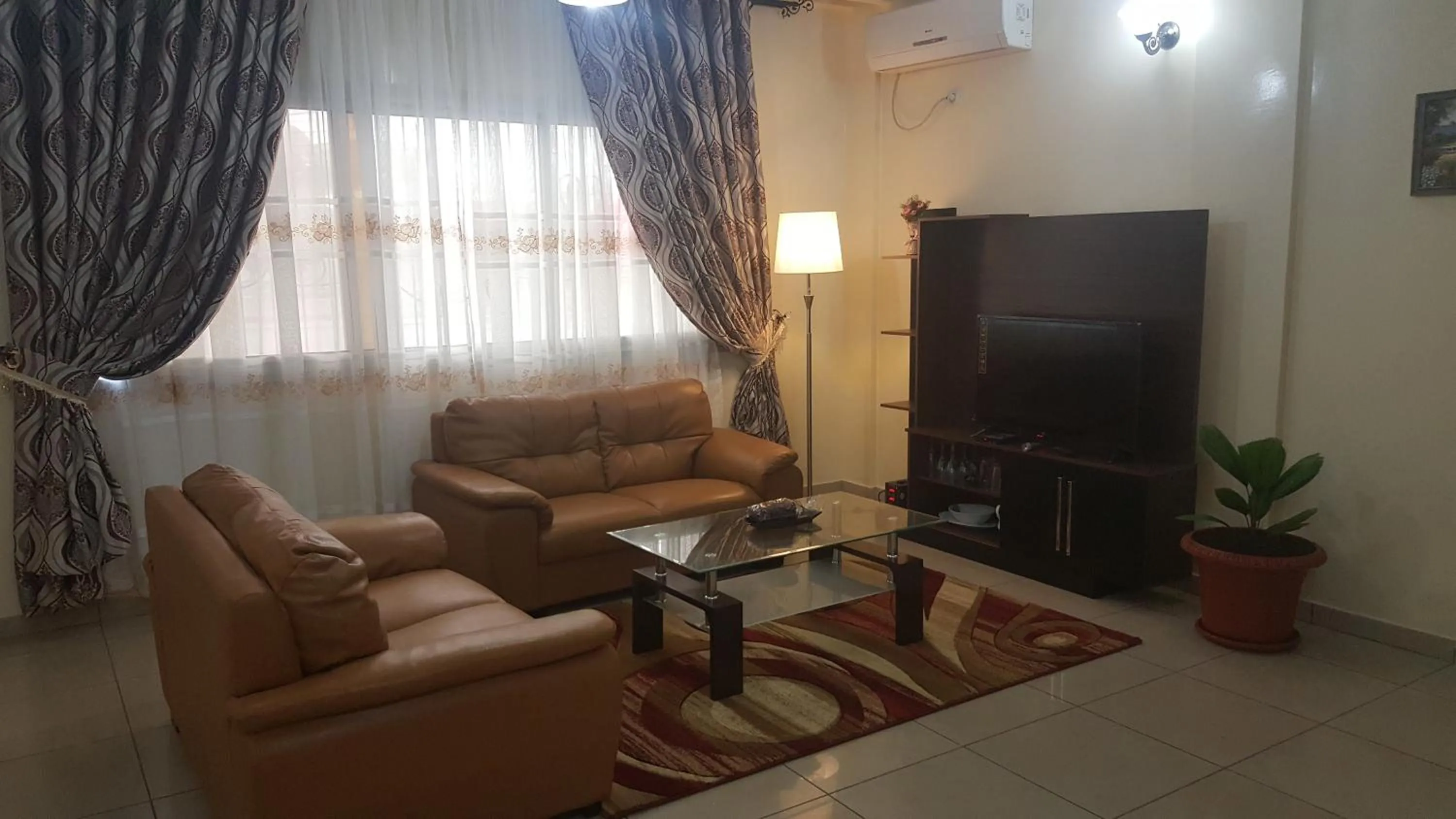 Living room in Résidences hôtelières Micheline et Emile BASTOS