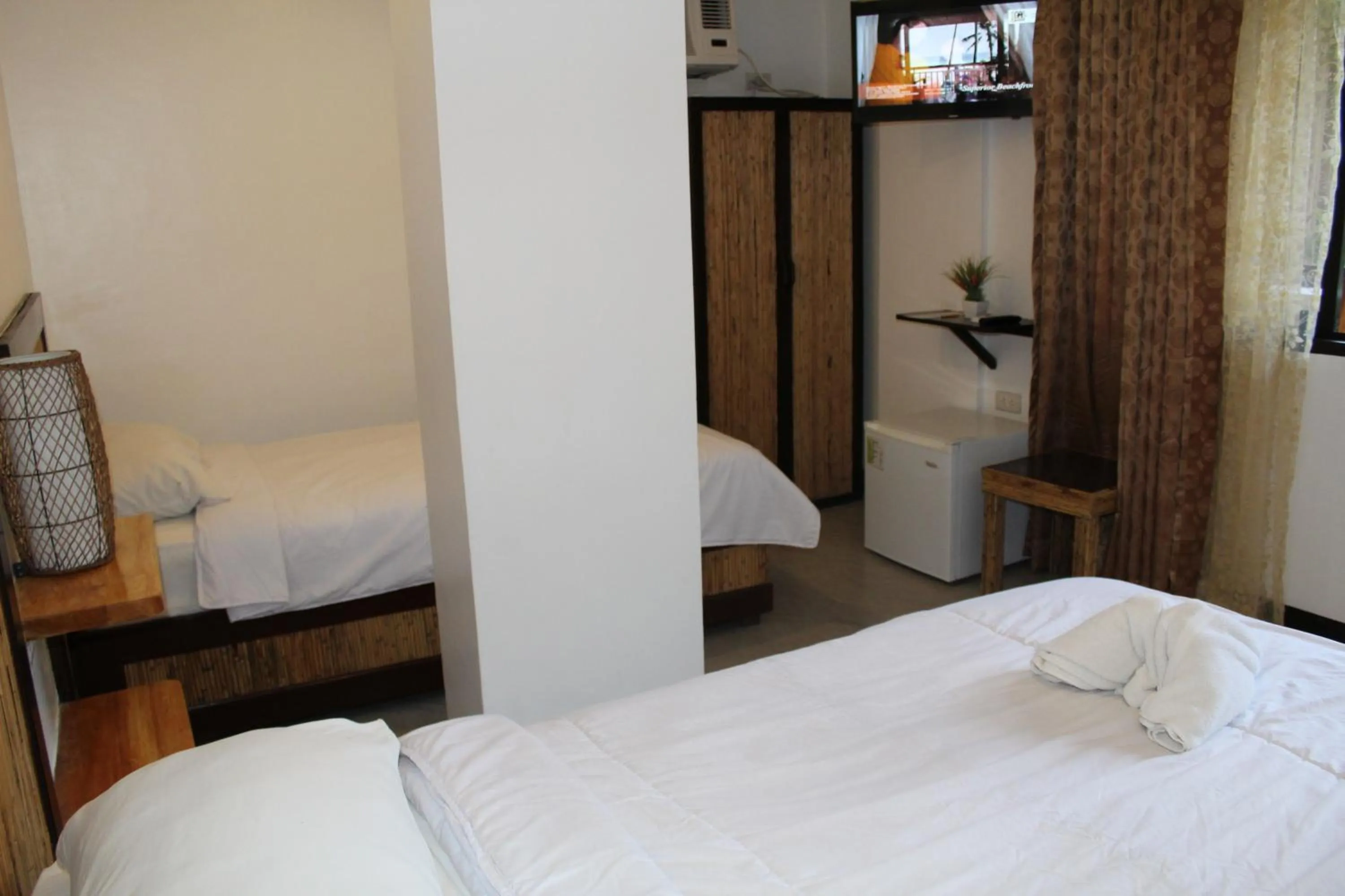 Photo of the whole room, Bed in Bamboo Beach Resort & Restaurant