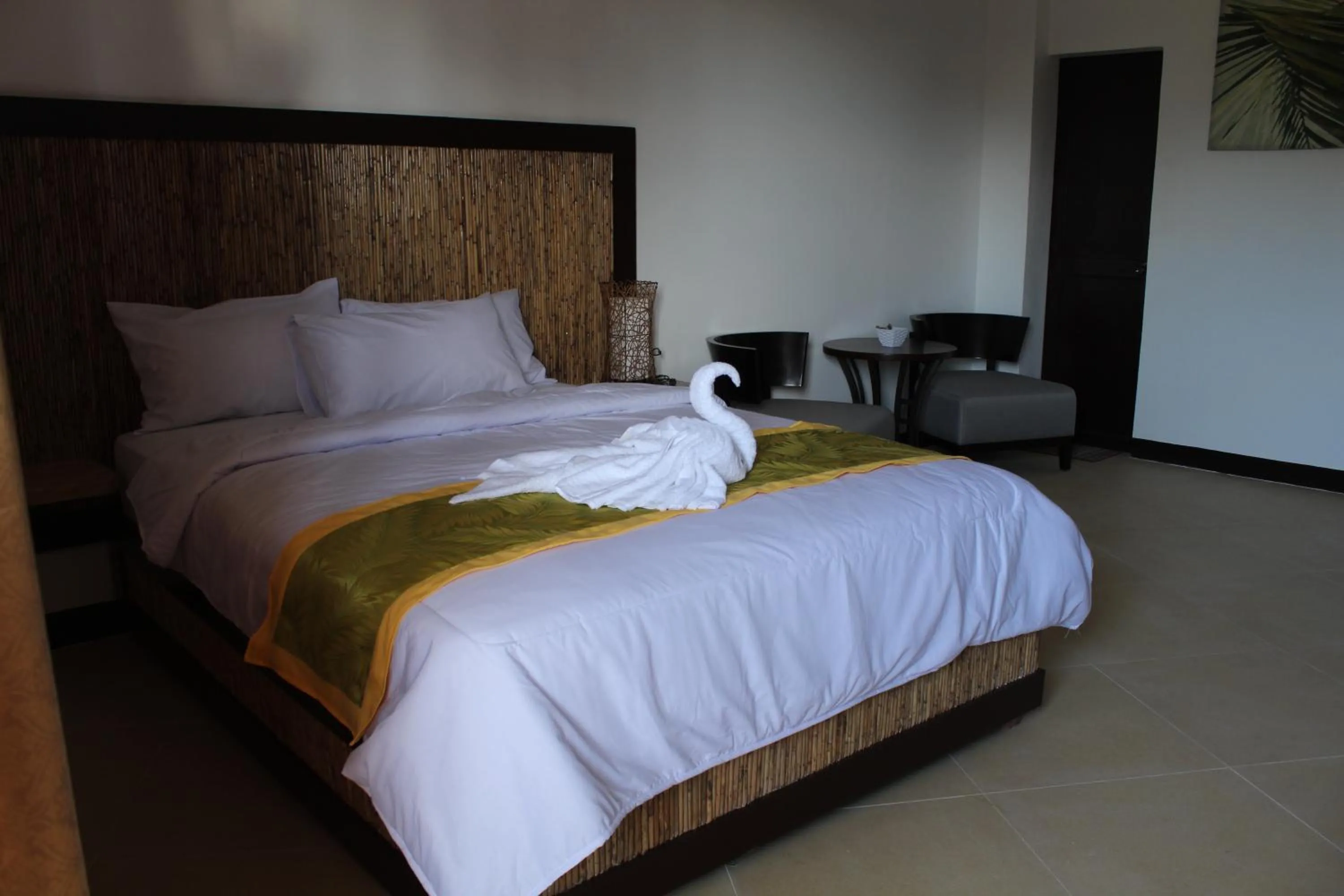 Photo of the whole room, Bed in Bamboo Beach Resort & Restaurant