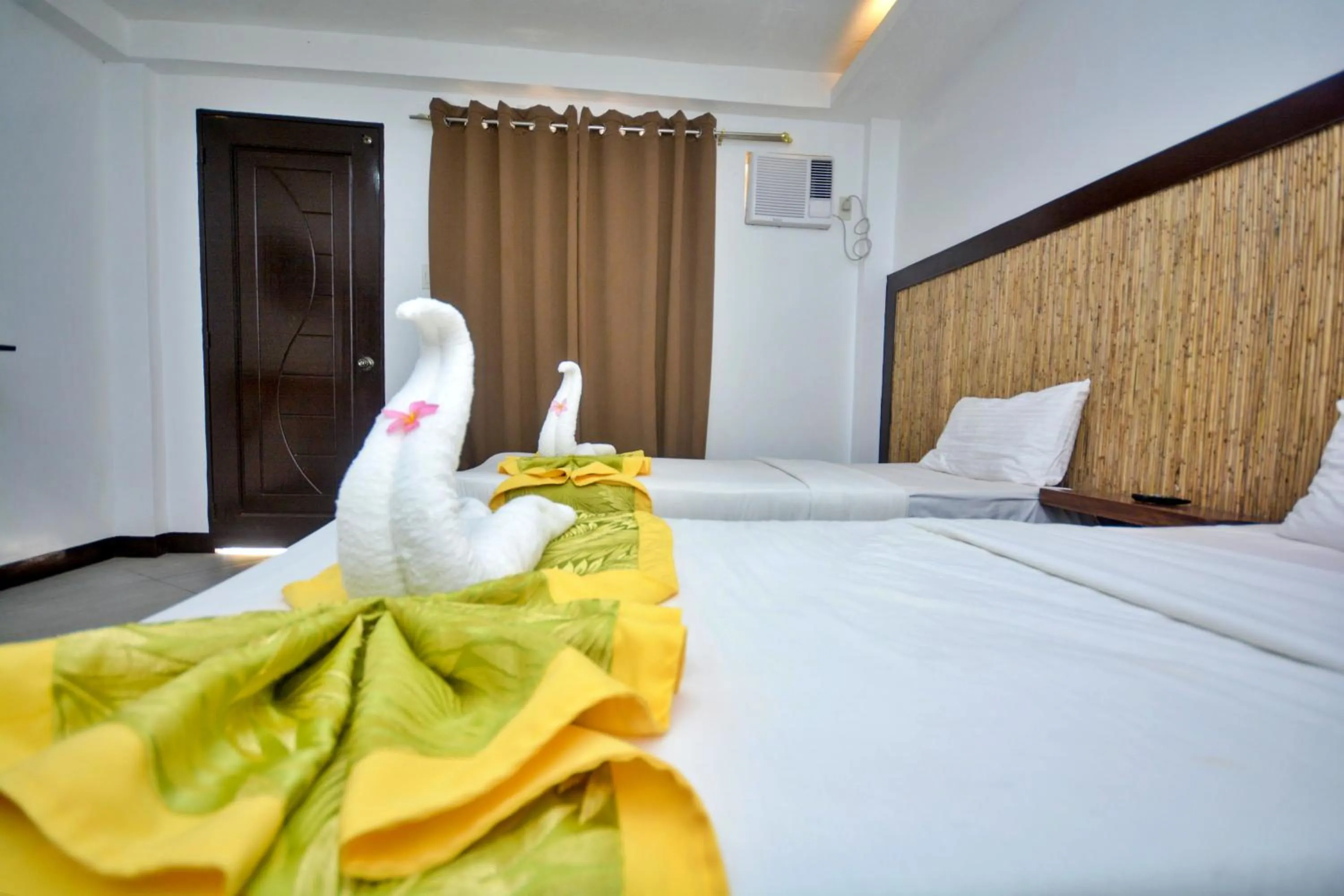 Bed in Bamboo Beach Resort & Restaurant