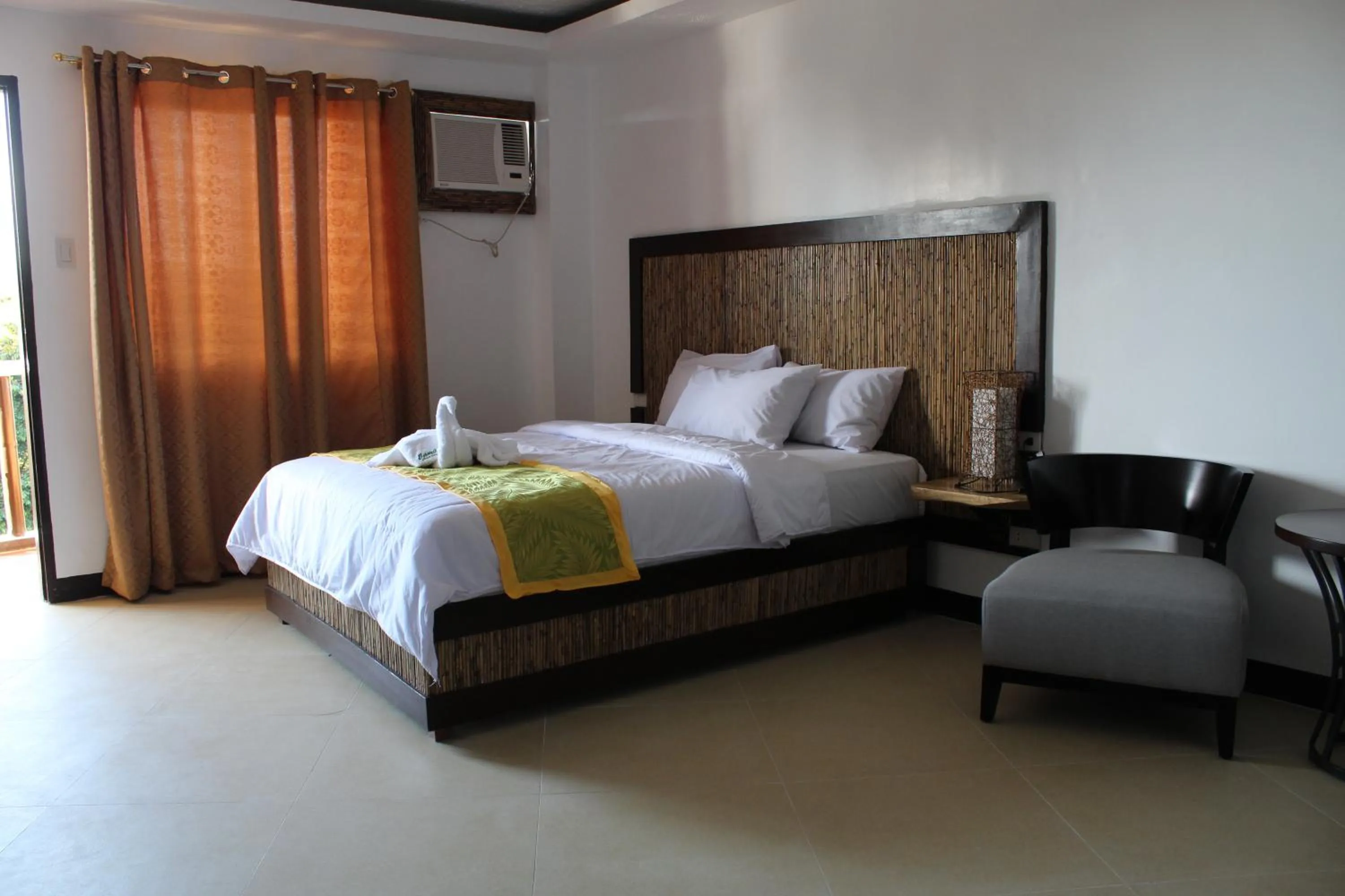 Photo of the whole room, Bed in Bamboo Beach Resort & Restaurant