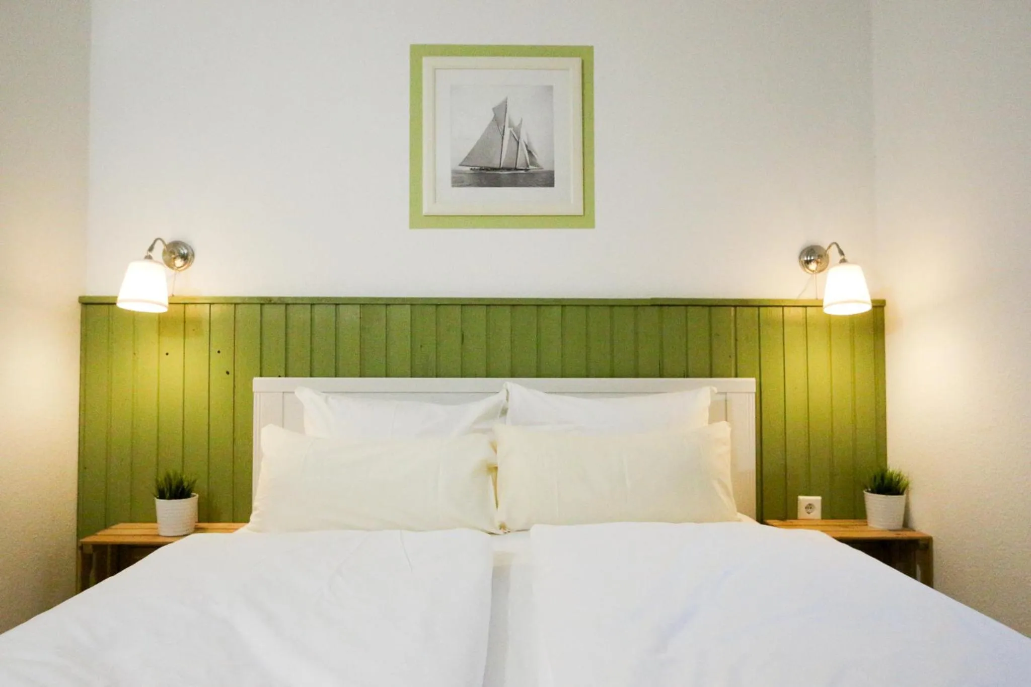 Bed in Captain Pahlen Ferienanlage