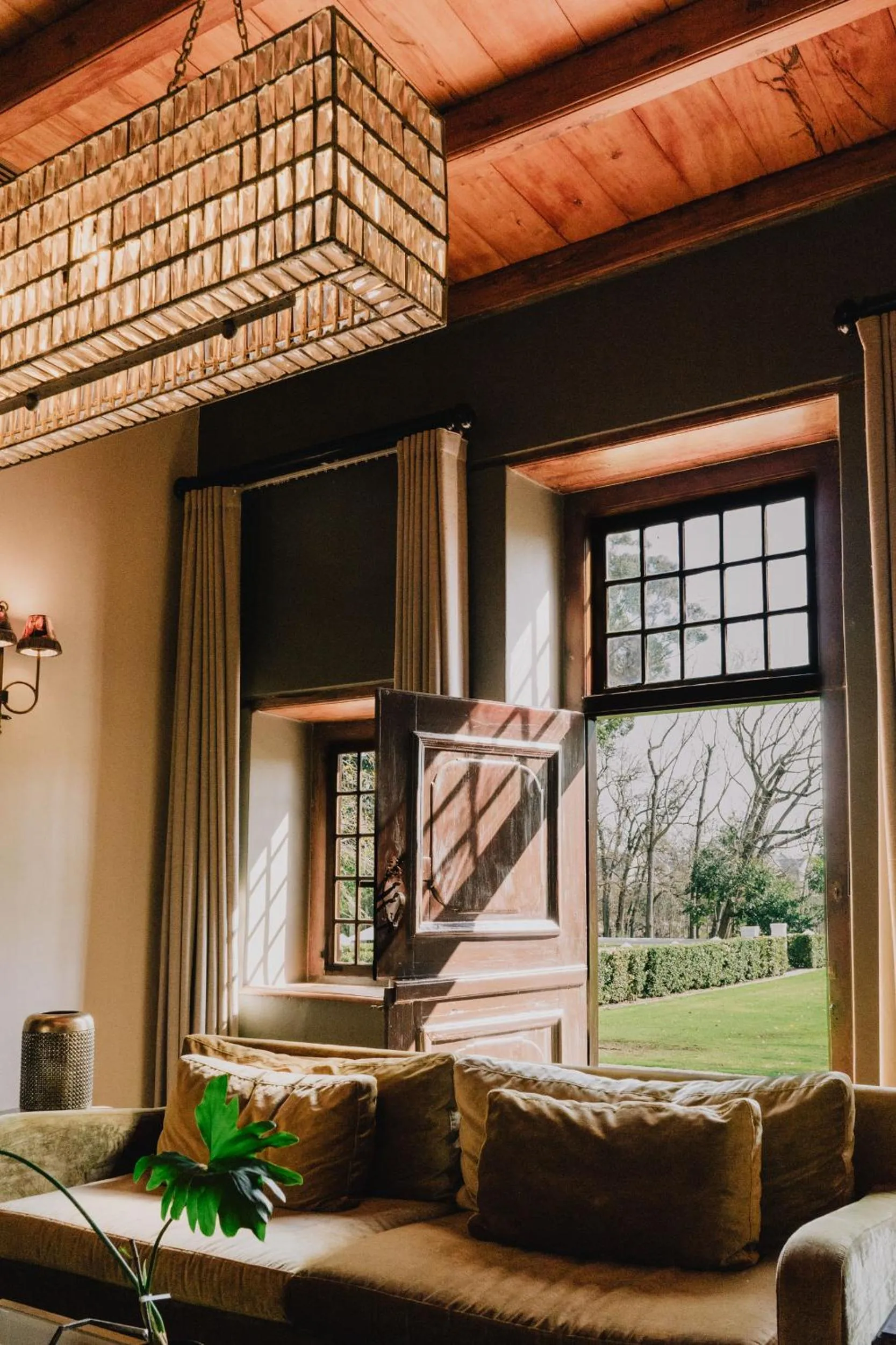 Living room in Blaauwklippen Manor by NEWMARK