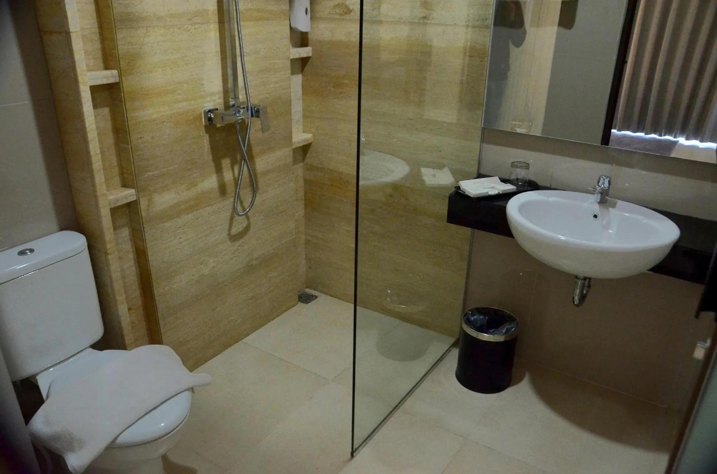 Bathroom in Alam Hotel by Cordela