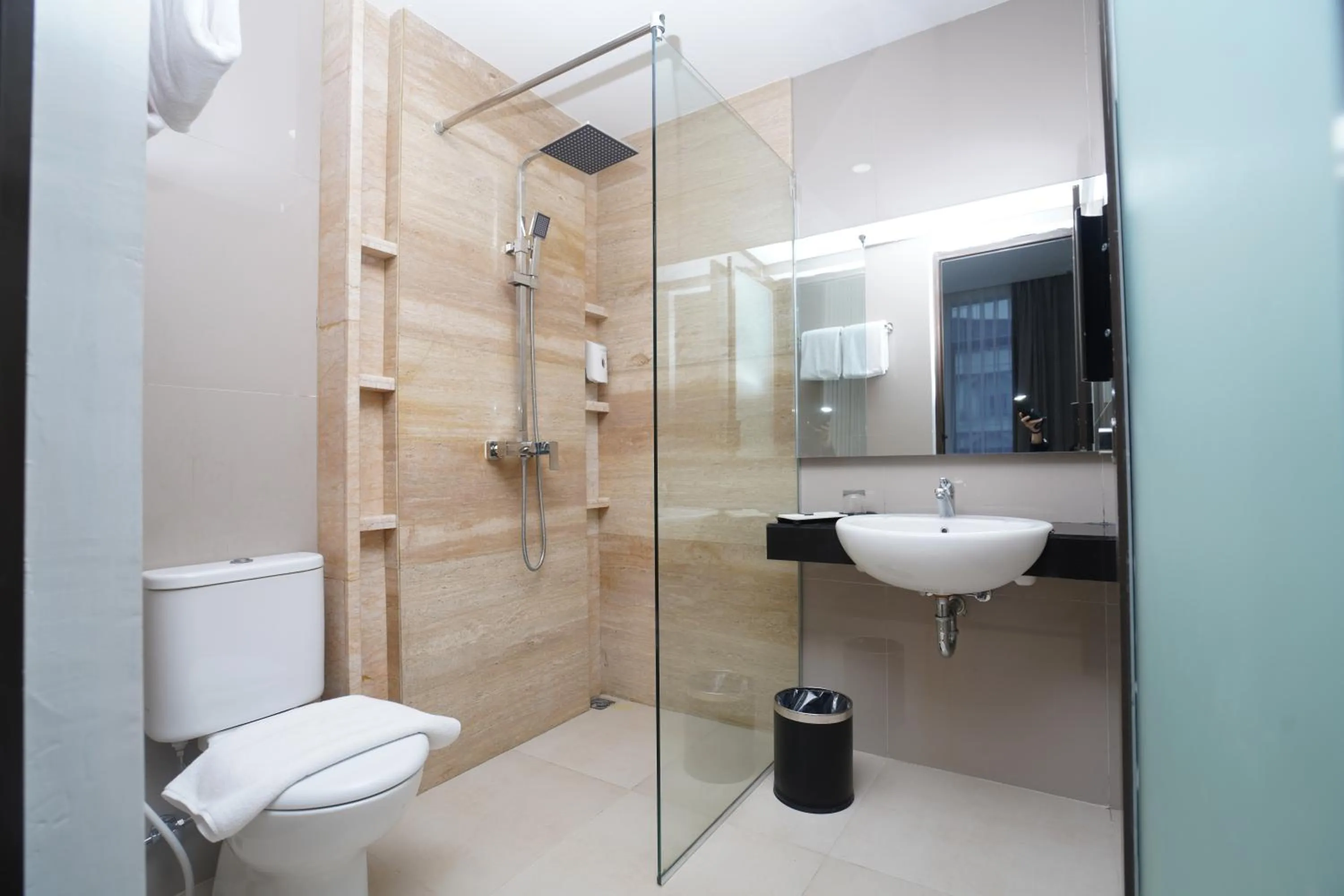 Bathroom in Alam Hotel by Cordela