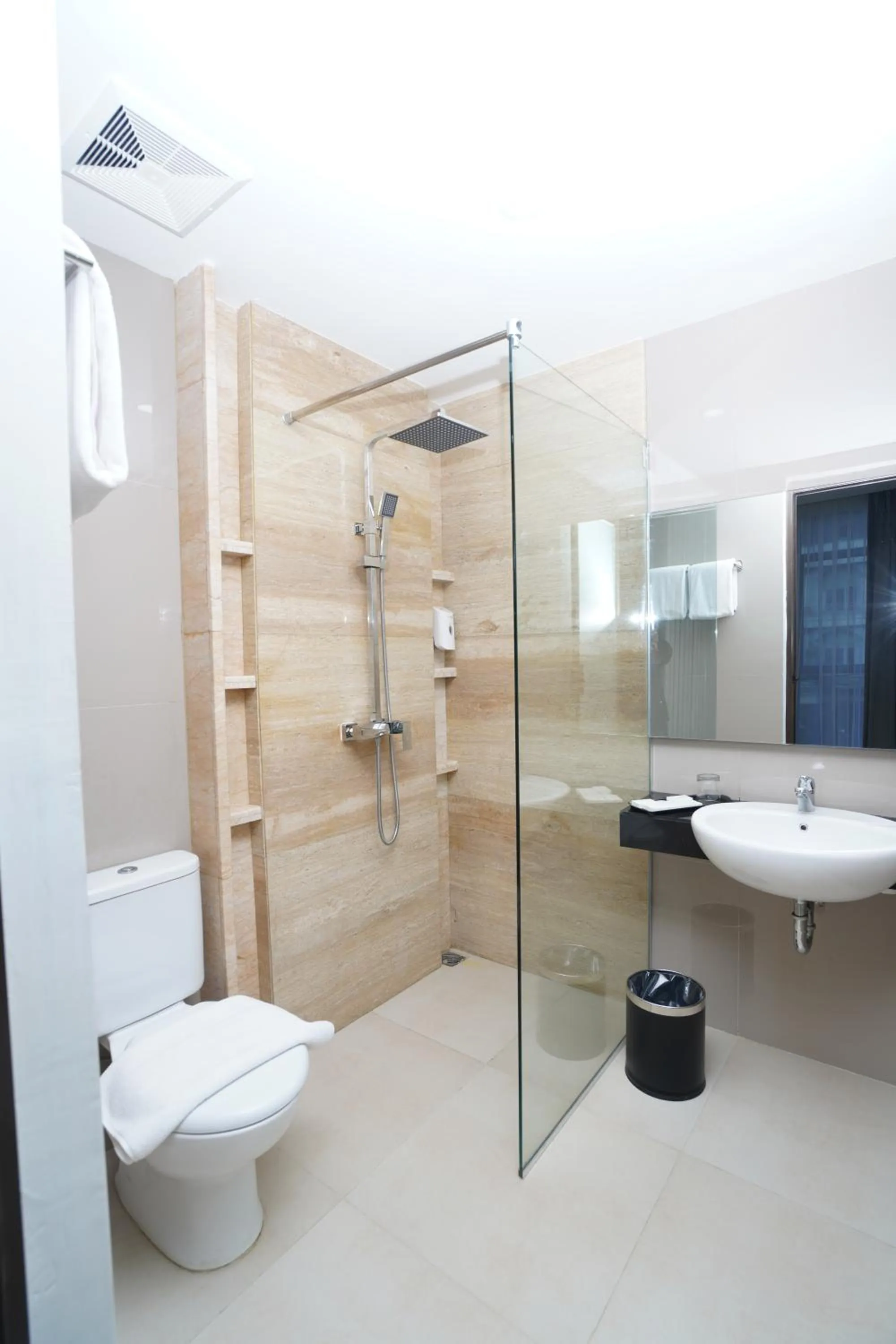 Bathroom in Alam Hotel by Cordela