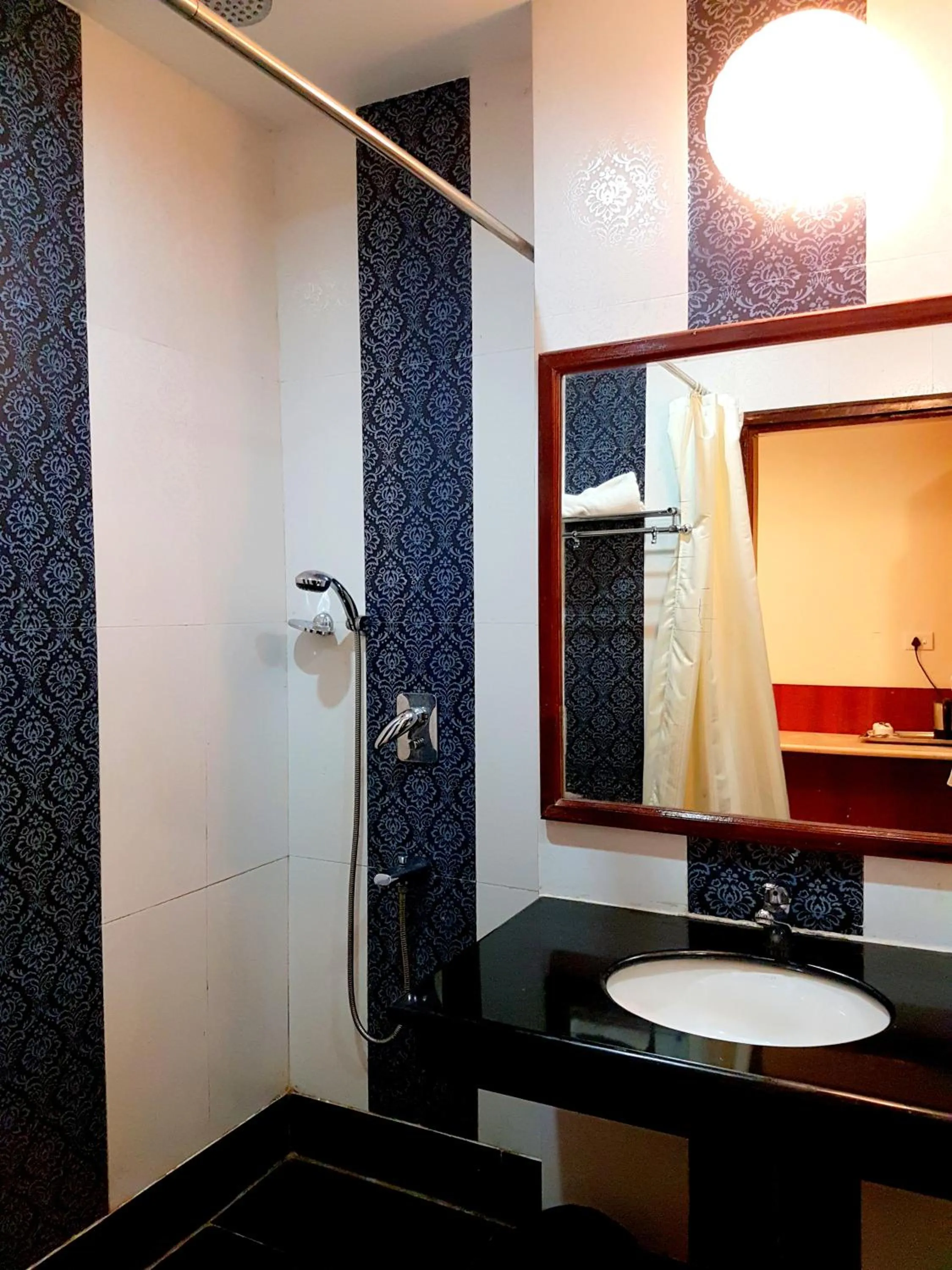 Bathroom in Hotel Sidharth