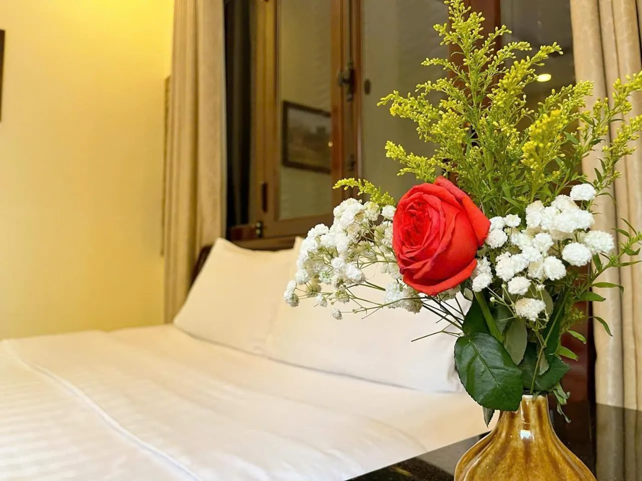 Bed in Golden River Hotel