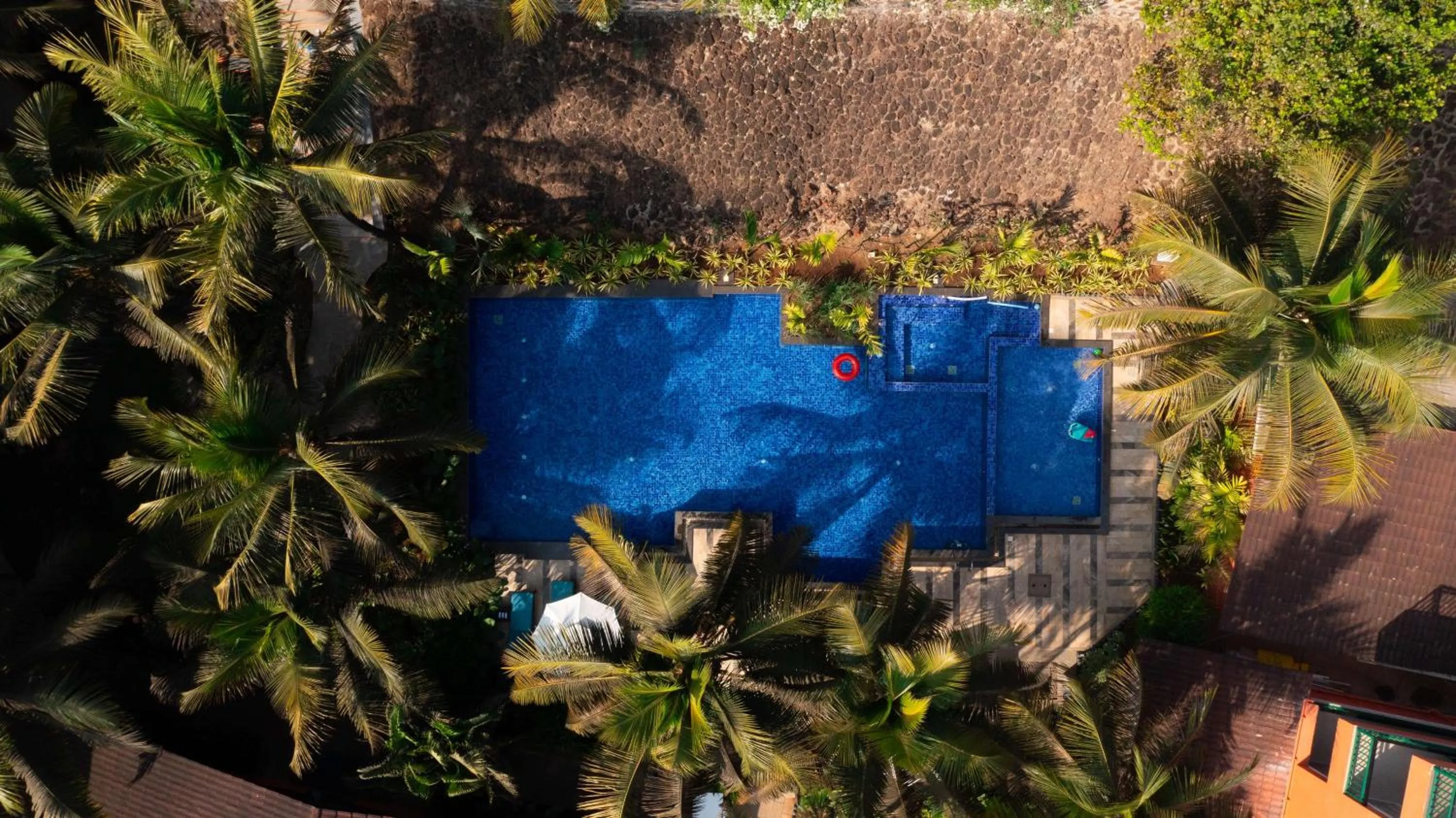 Pool view in Mandrem Beach Resort, a member of Radisson Individuals Retreat