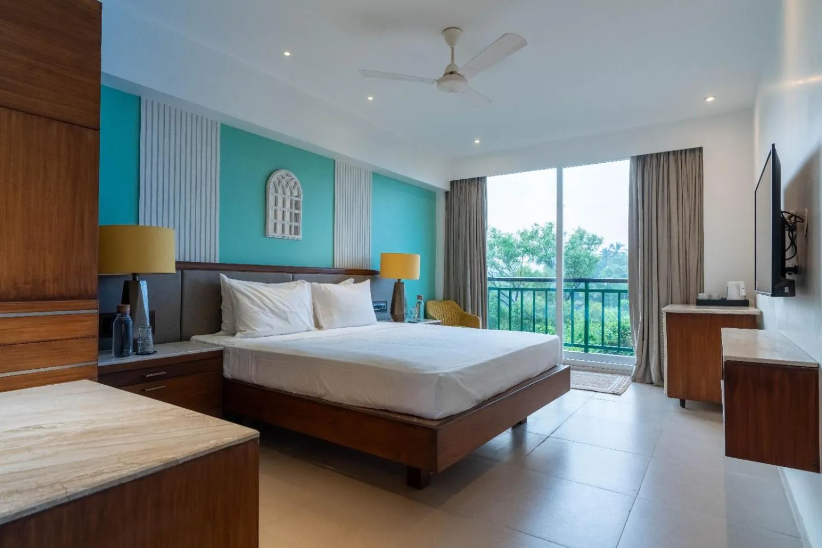 Bed in Mandrem Beach Resort, a member of Radisson Individuals Retreat
