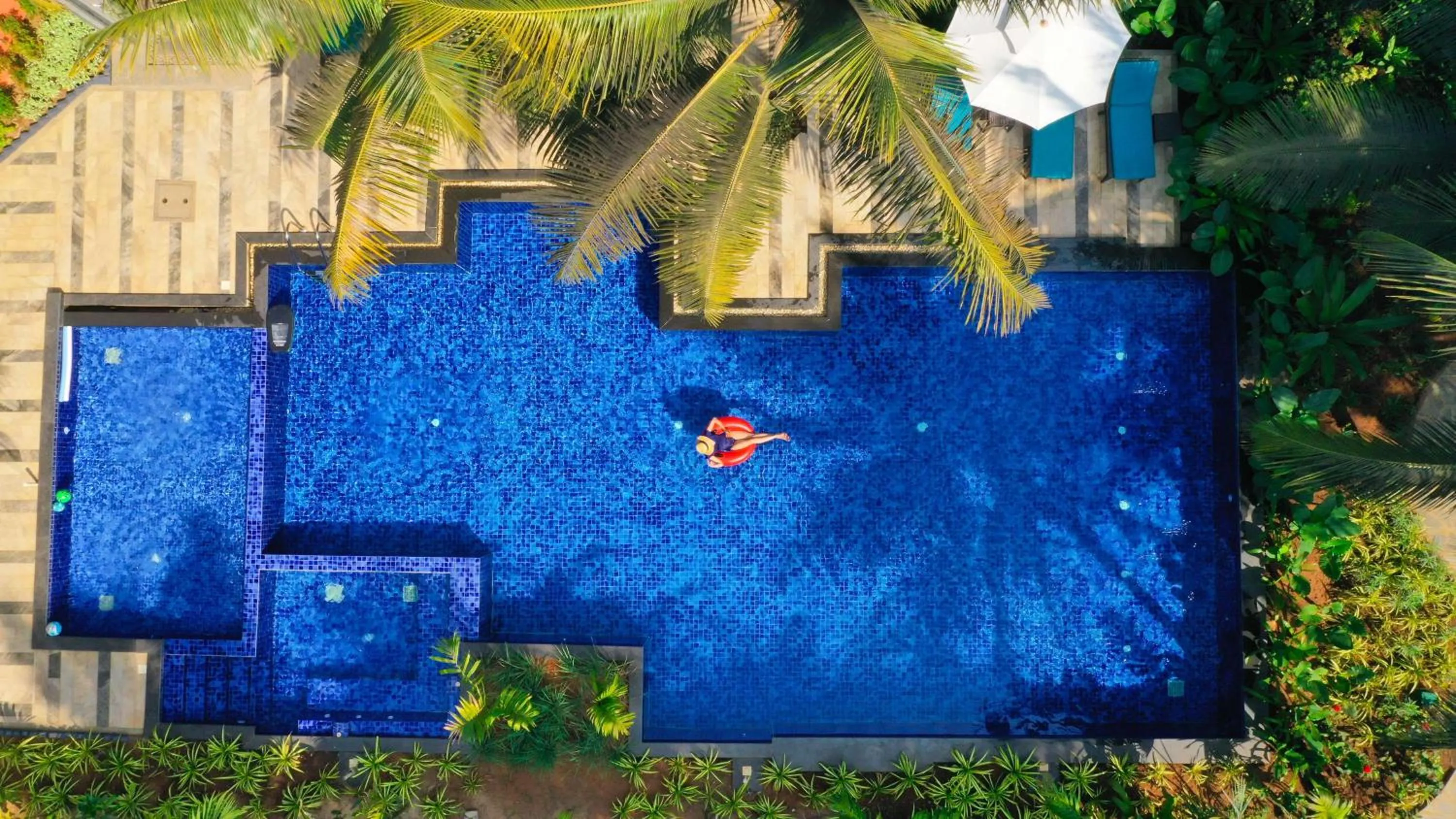 Pool view in Mandrem Beach Resort, a member of Radisson Individuals Retreat