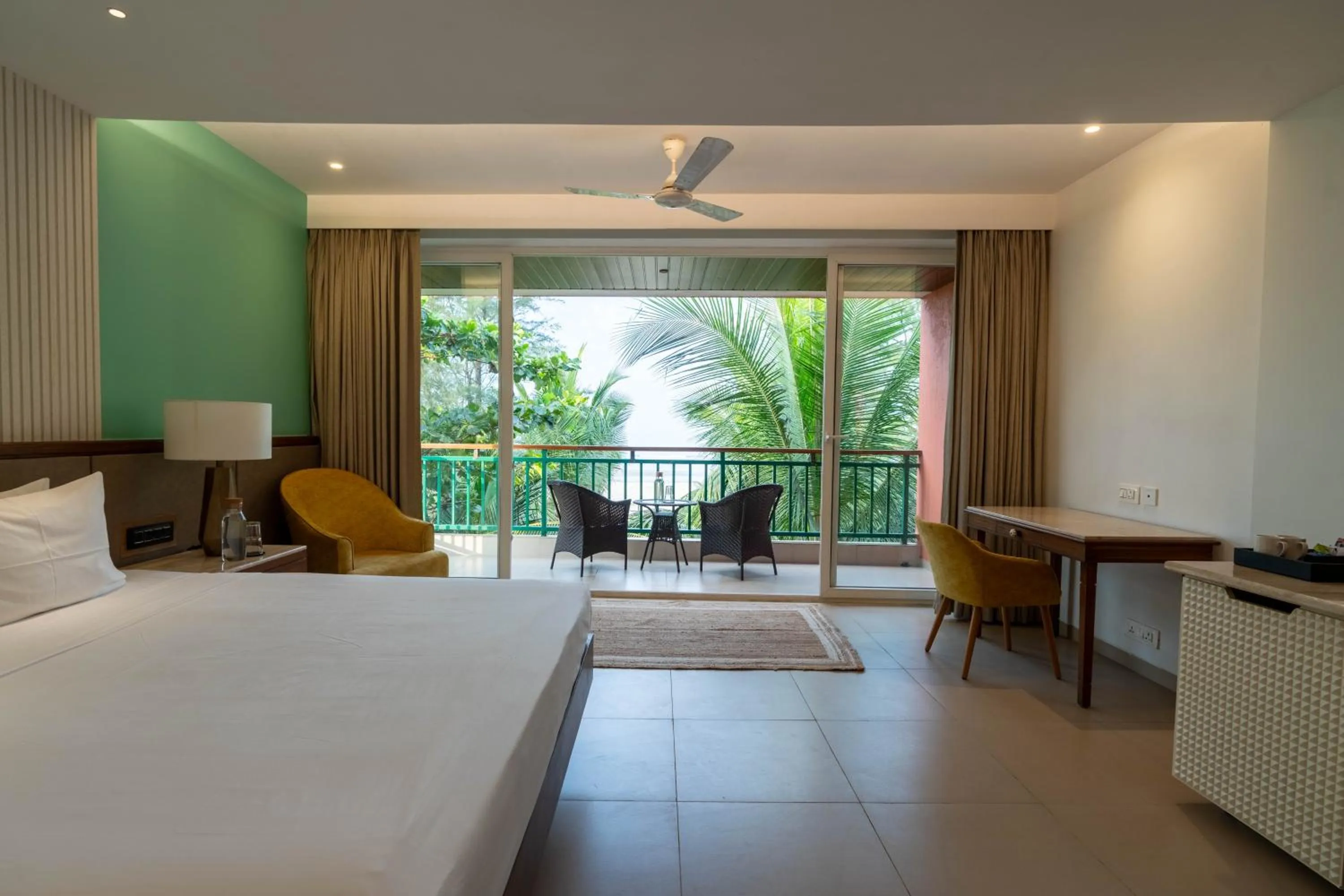 Bed in Mandrem Beach Resort, a member of Radisson Individuals Retreat