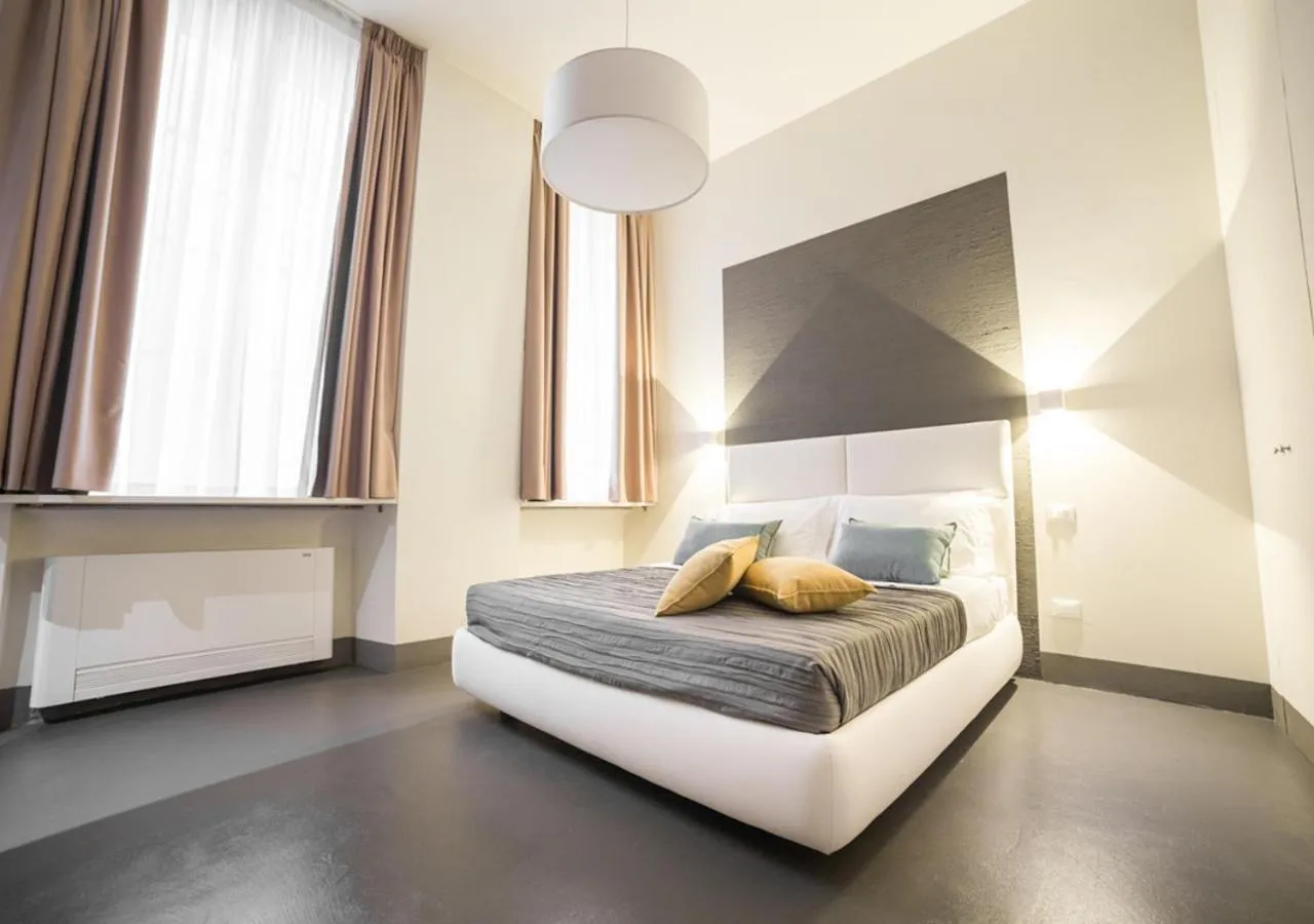 Bed in LUCUS Exclusive Bed and Breakfast