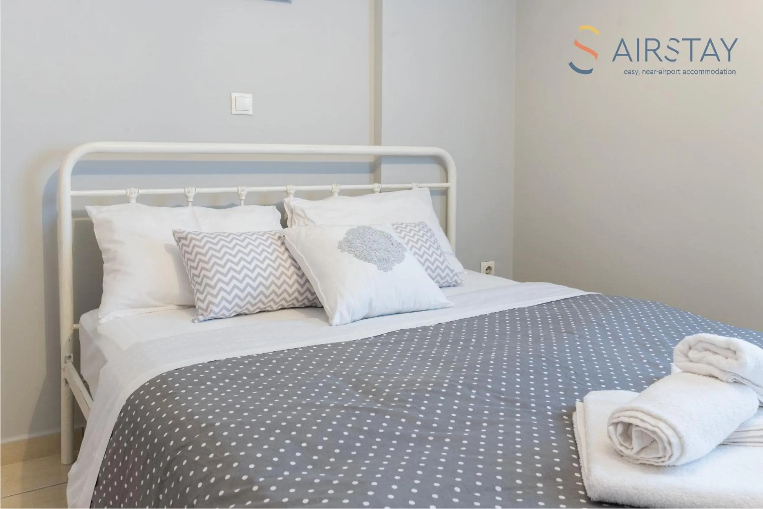 Bed in Elise Apartment Airport by Airstay