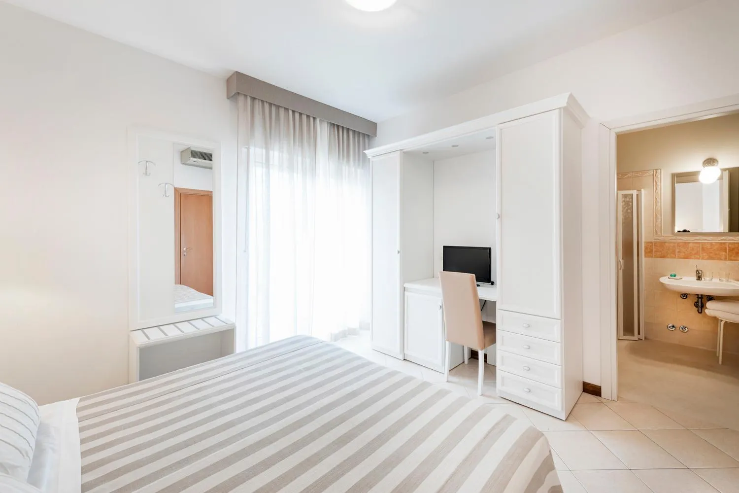 Bed in Hotel Andreaneri