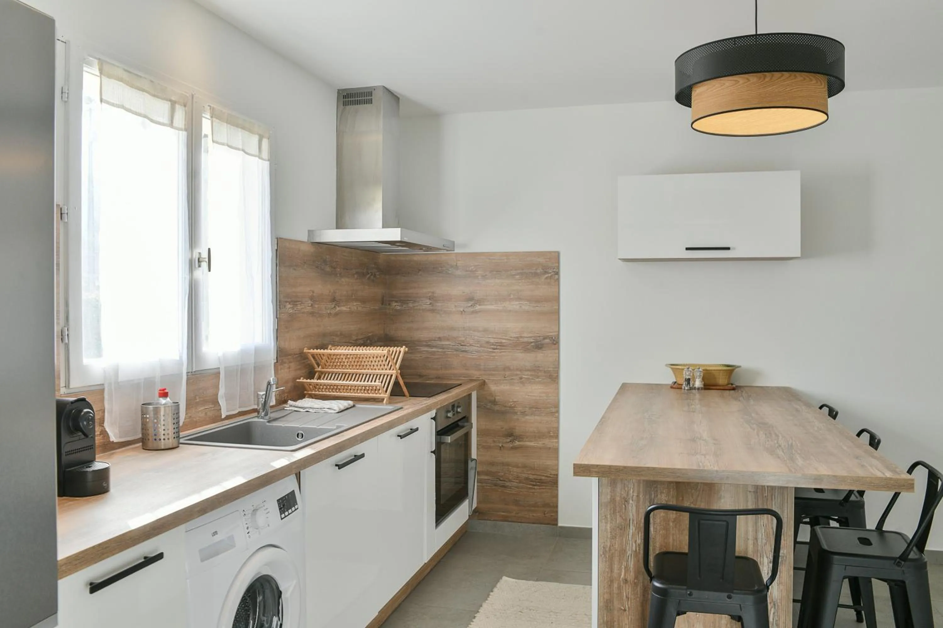 Kitchen or kitchenette in Les Villas du Domaine de Suzel