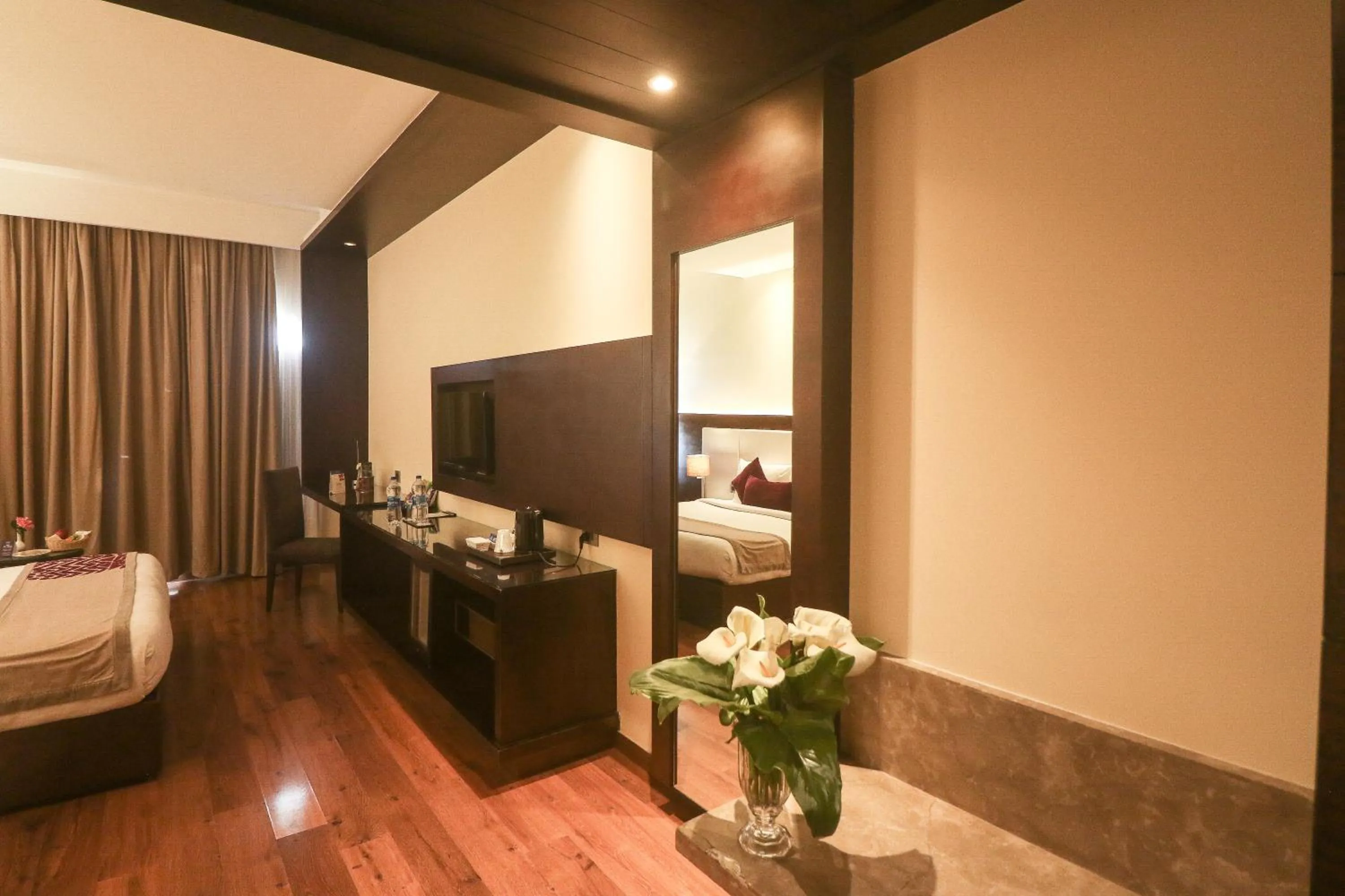 Photo of the whole room, Bed in Marigold Sarovar Portico Shimla