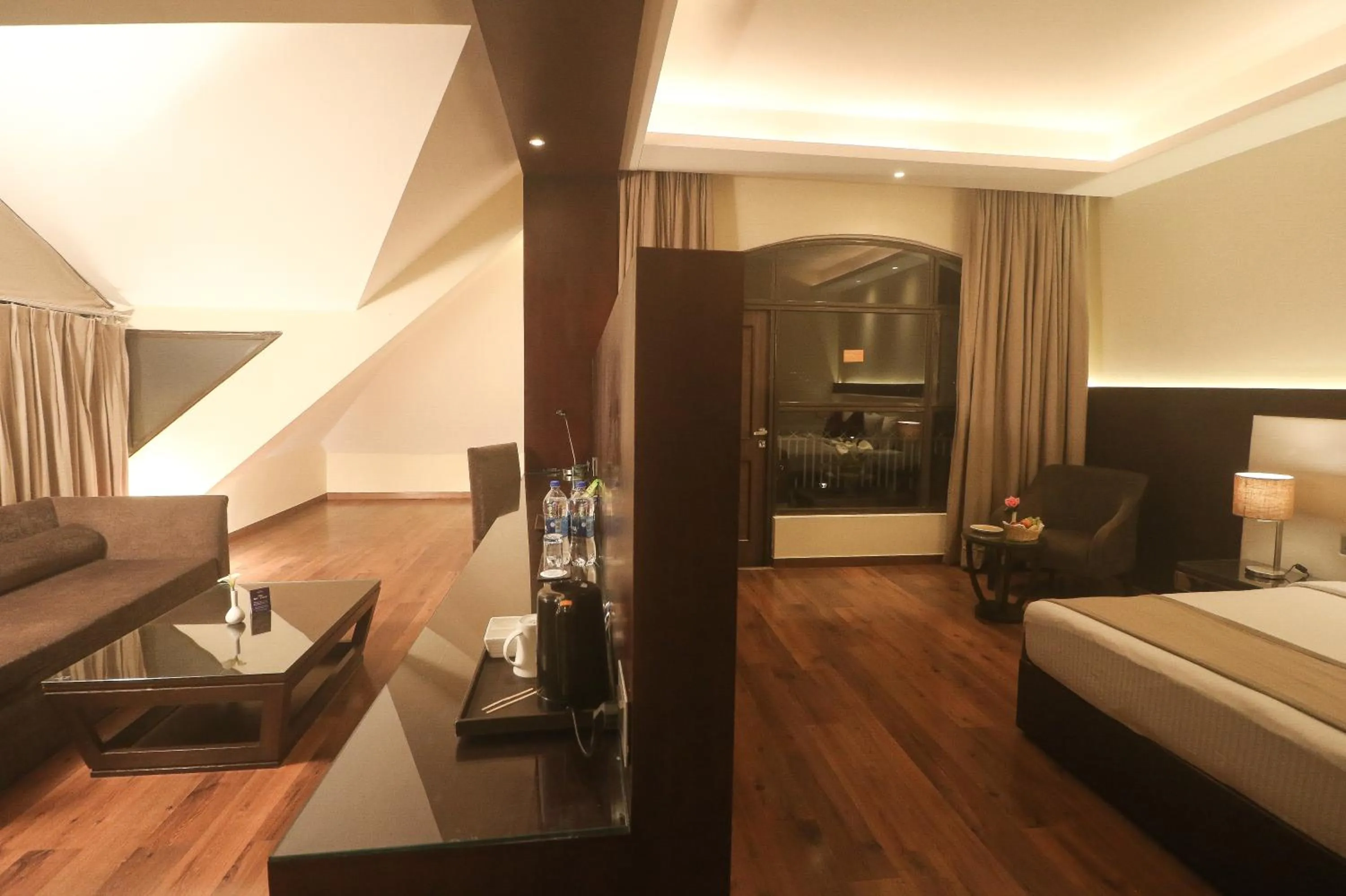 Photo of the whole room, Bed in Marigold Sarovar Portico Shimla