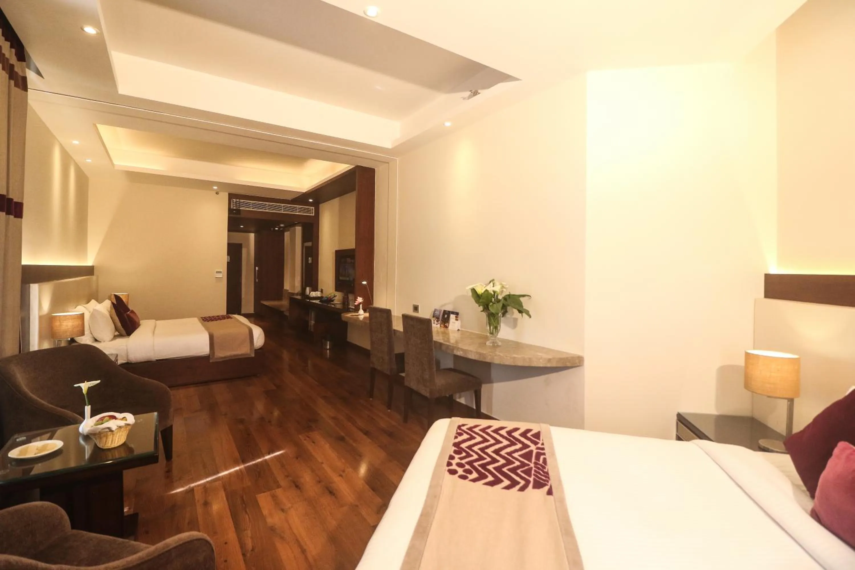 Photo of the whole room, Bed in Marigold Sarovar Portico Shimla