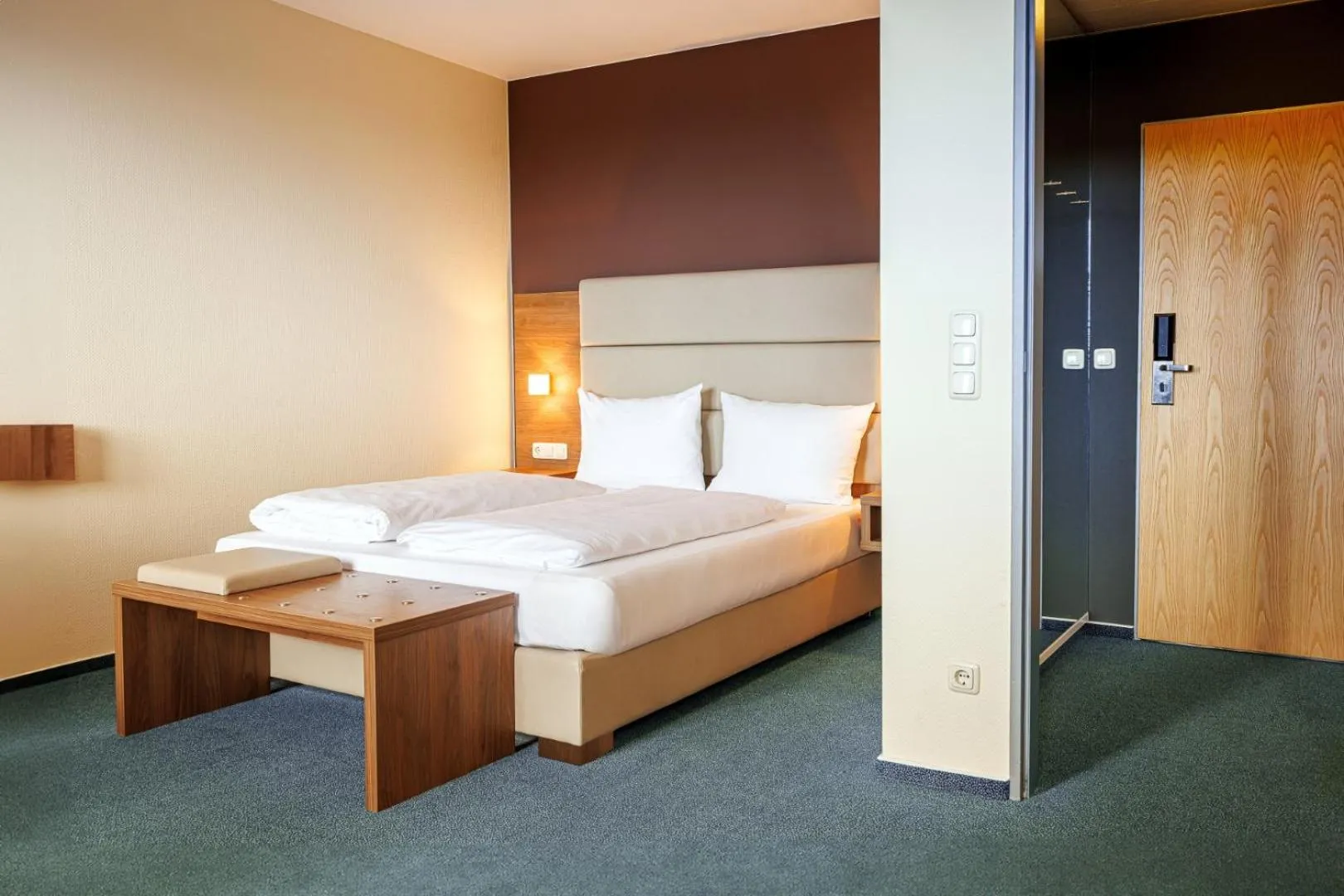 Photo of the whole room, Bed in GenoHotel Forsbach