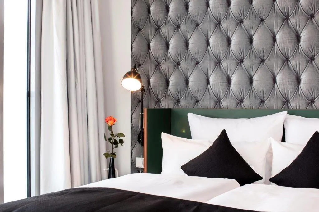 Bed in Pandion Boardinghouse