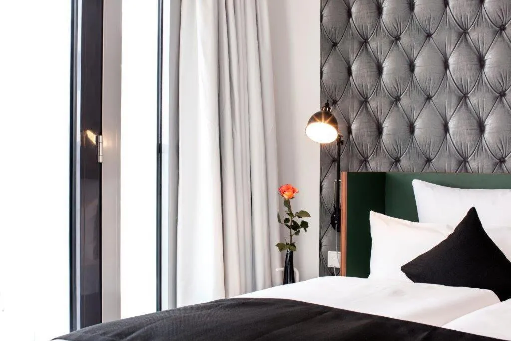 Bed in Pandion Boardinghouse