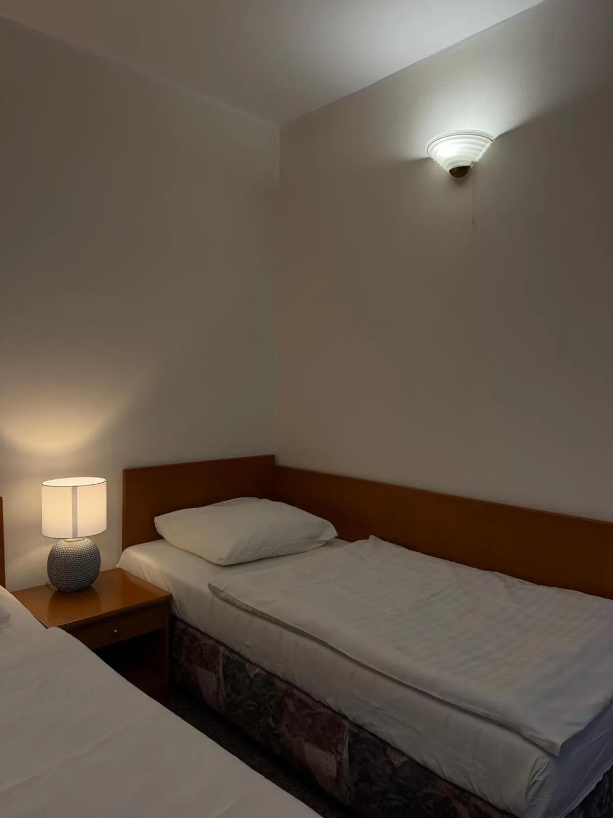 Bed in Hotel Dana